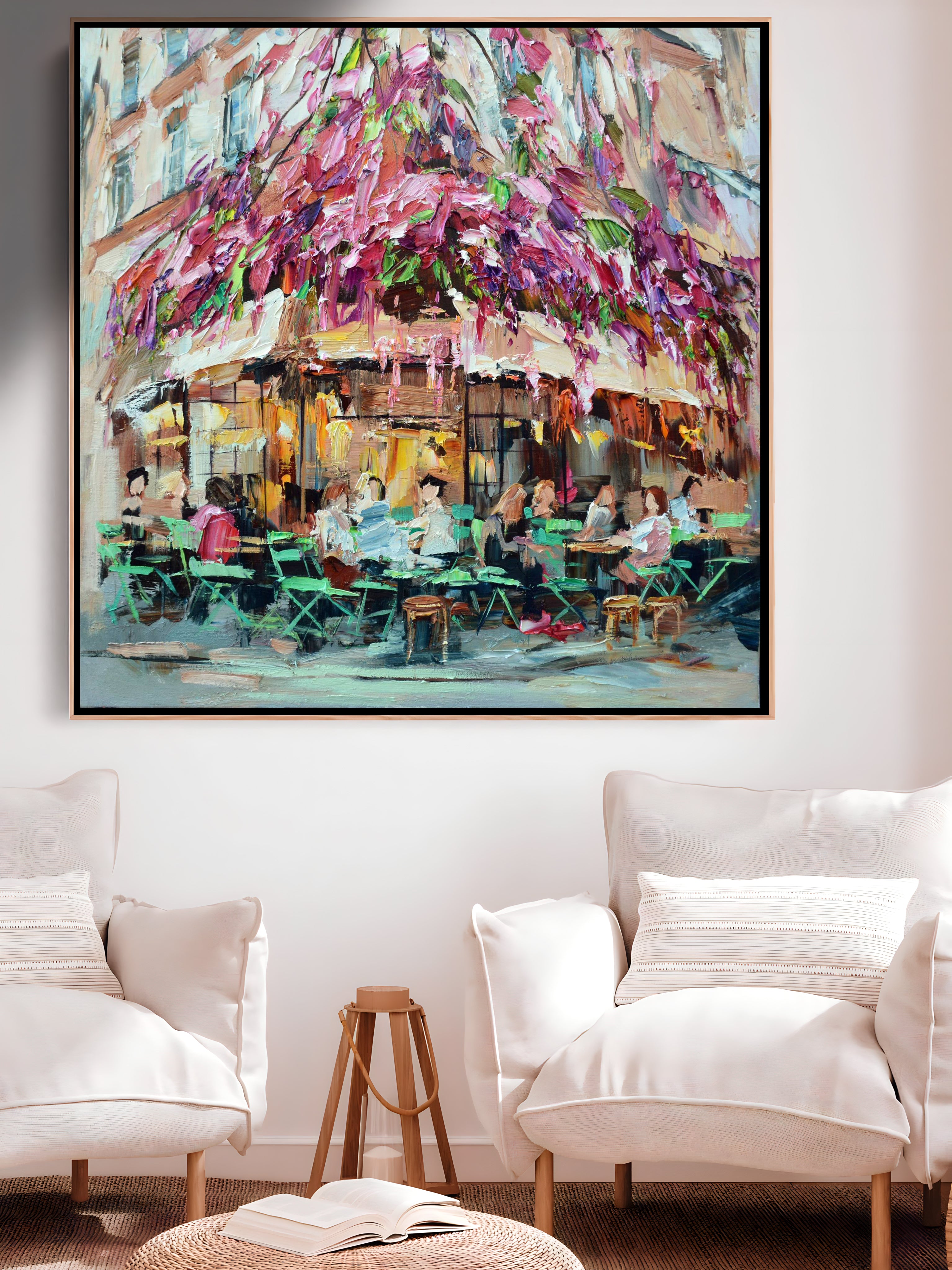 a painting of people sitting at a table under an umbrella