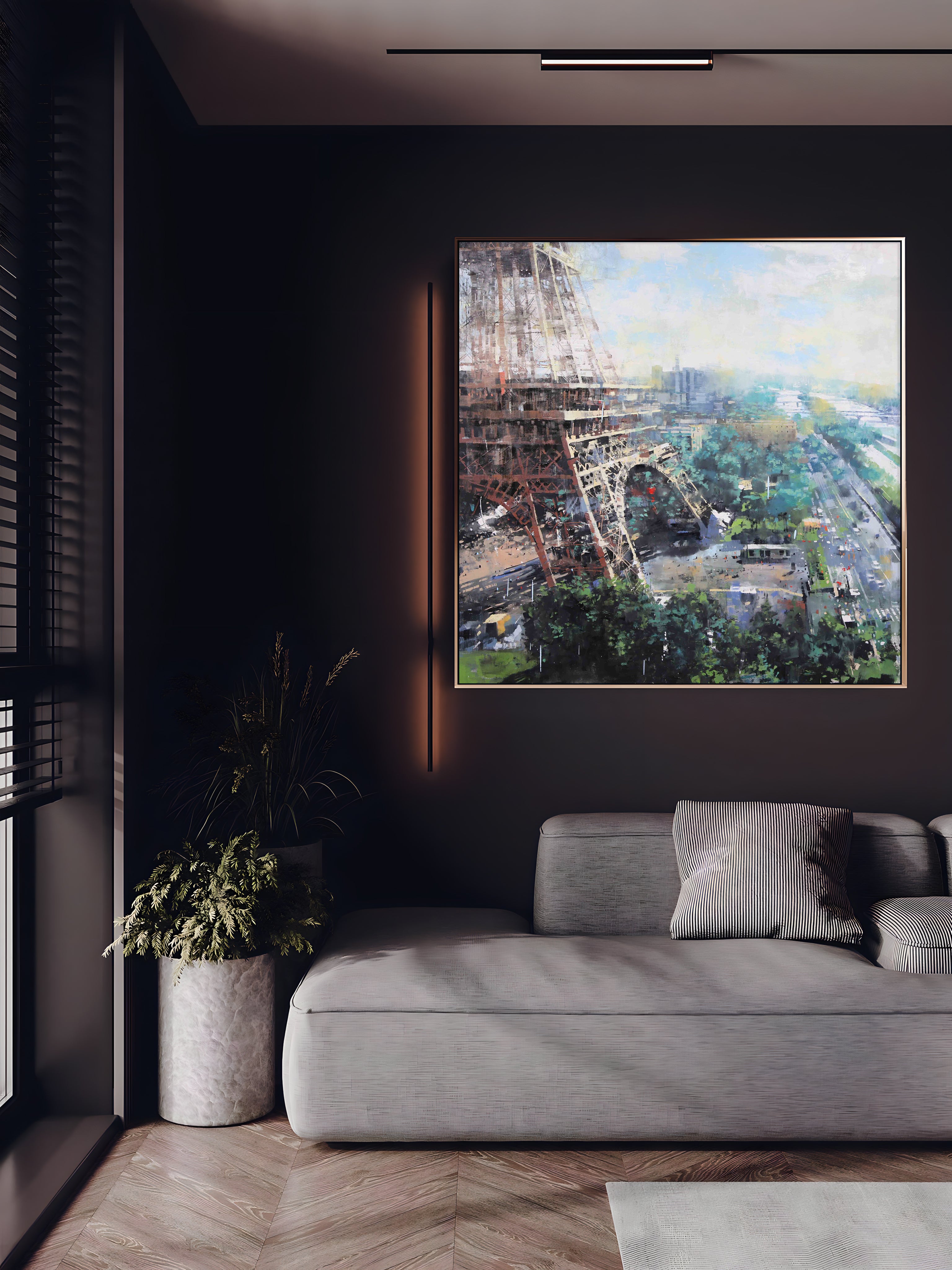 a living room with a couch and a painting on the wall
