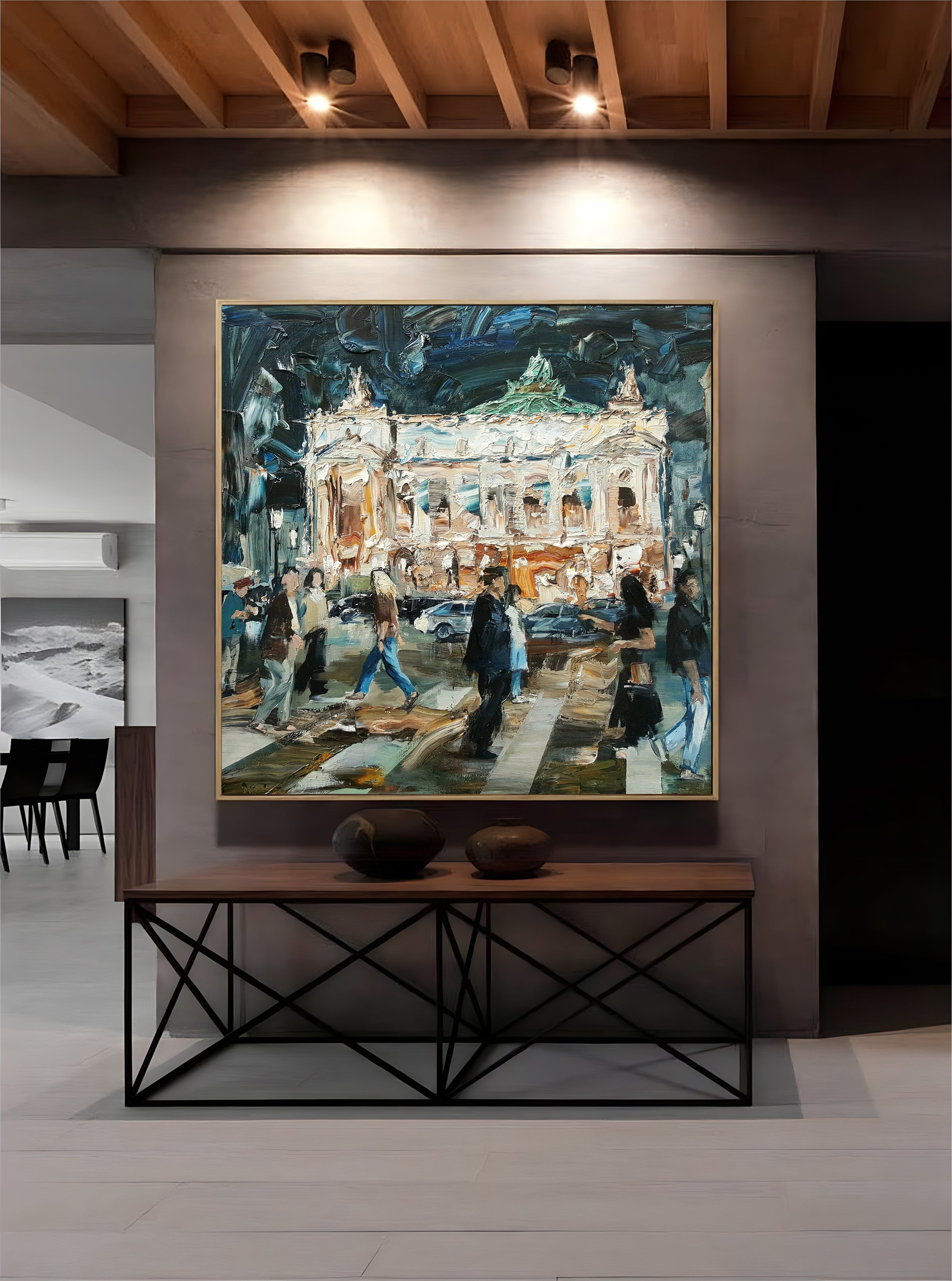 a painting hanging on a wall in a room