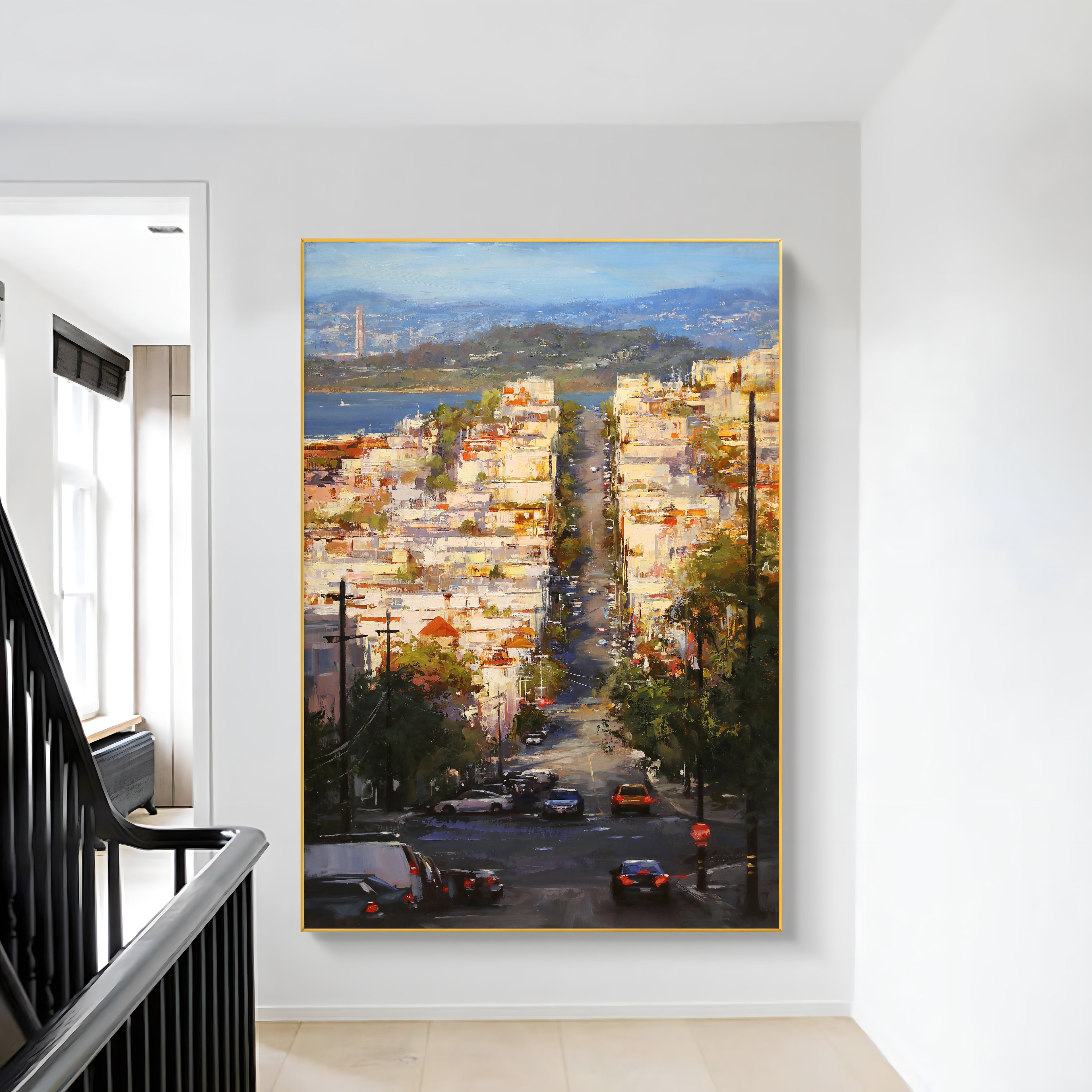a painting hanging on a wall next to a stair case