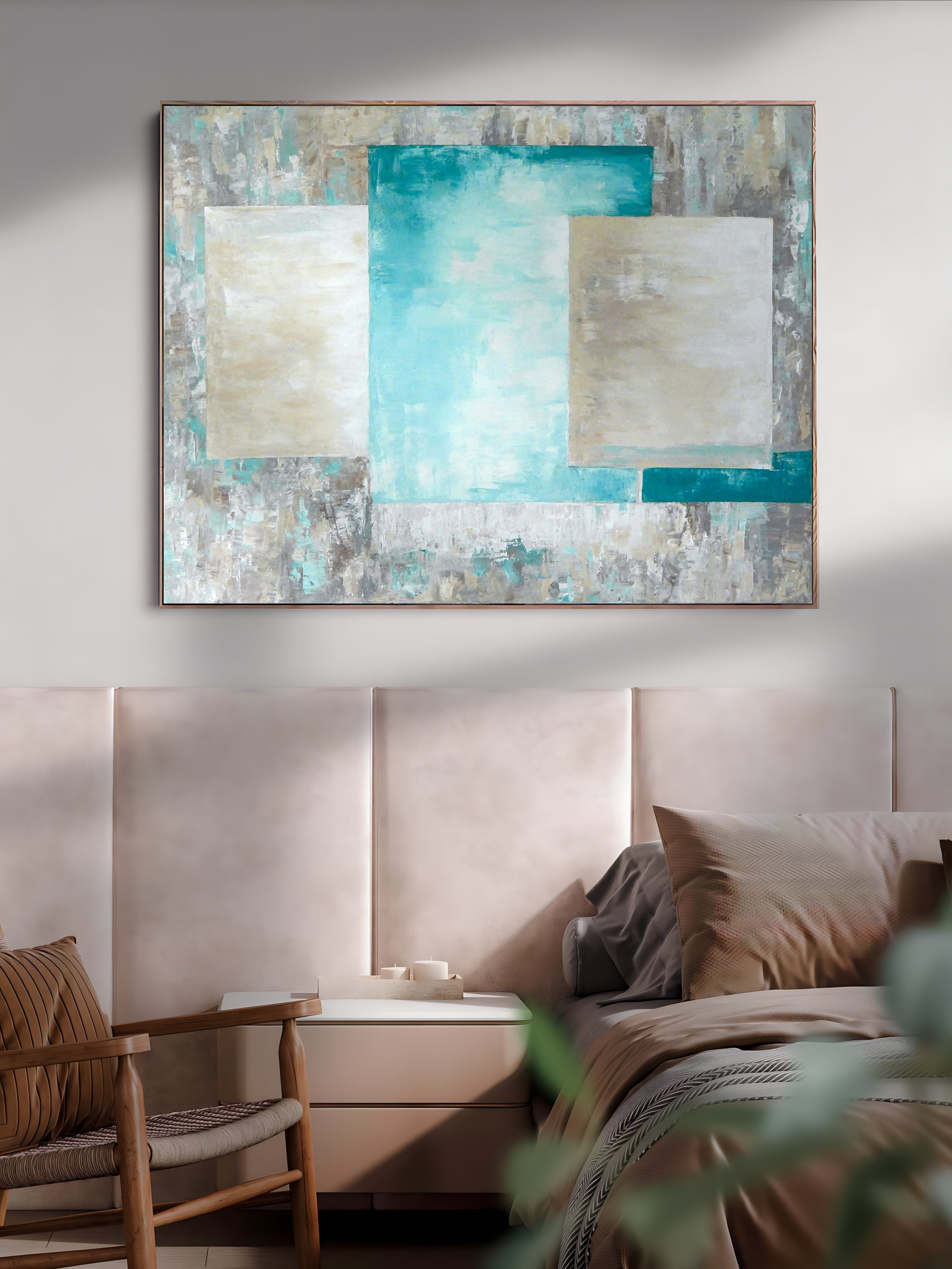 a painting hanging on a wall above a bed