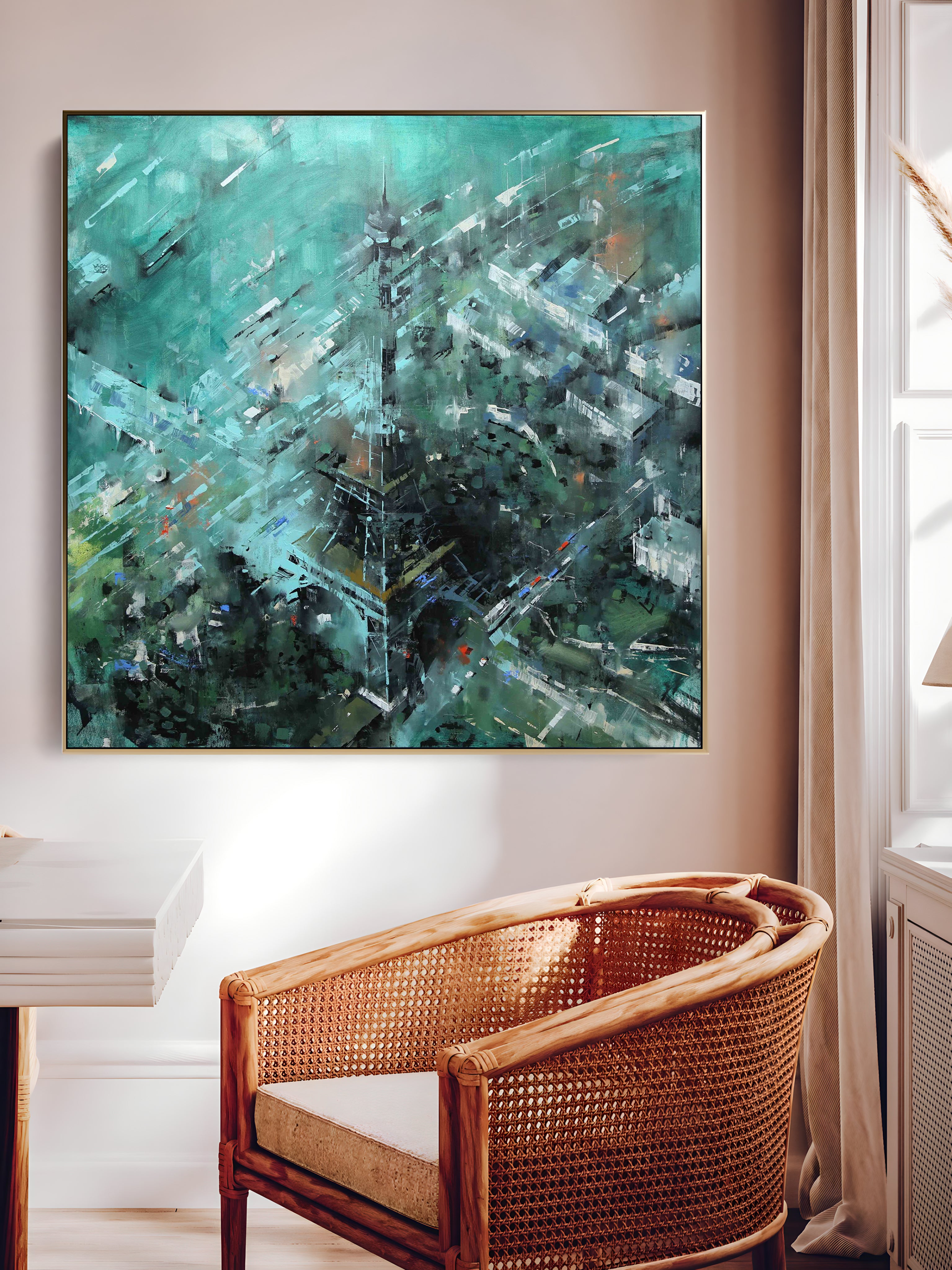 a painting hanging on a wall above a chair