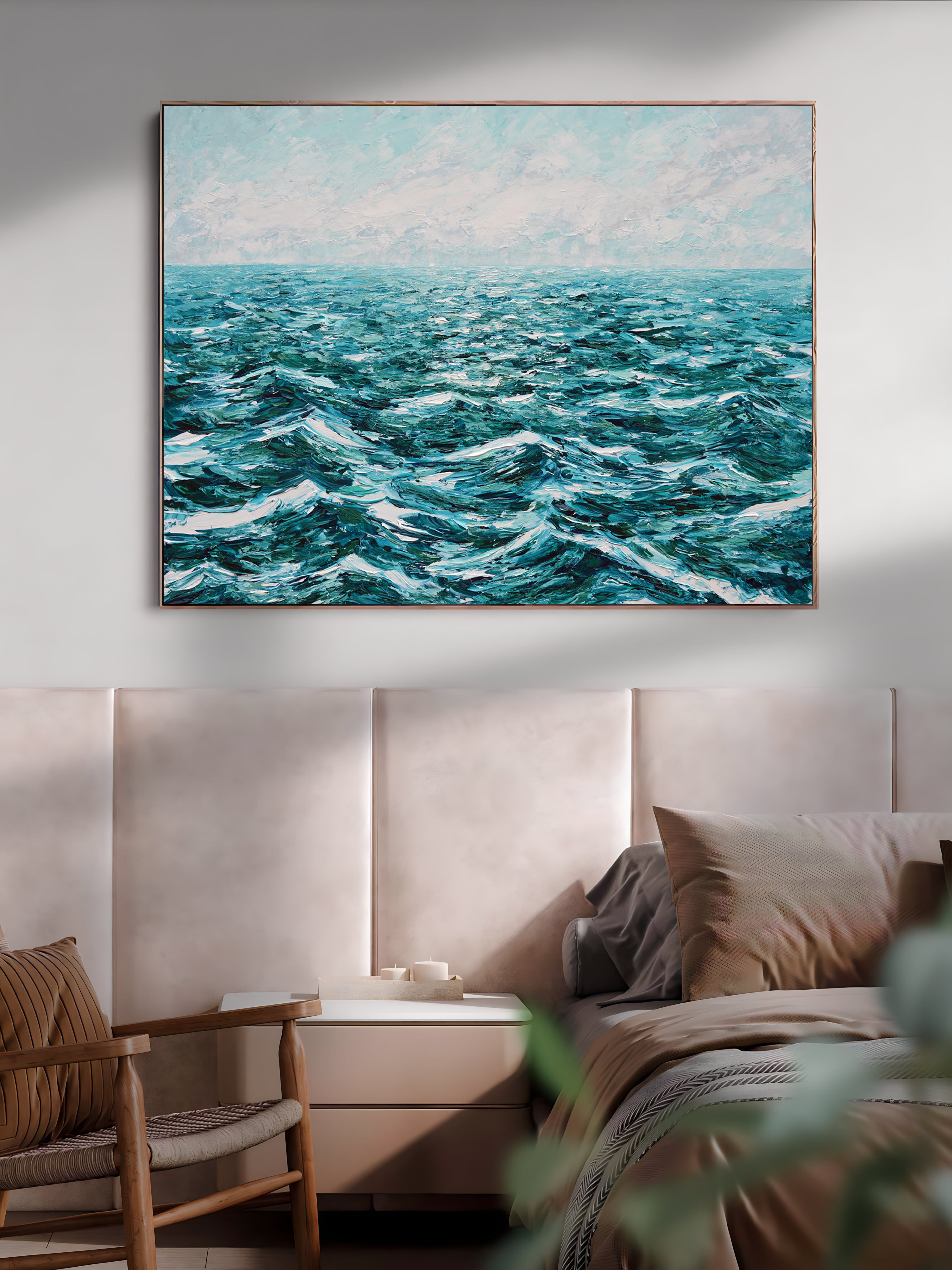 a painting hanging above a bed in a bedroom
