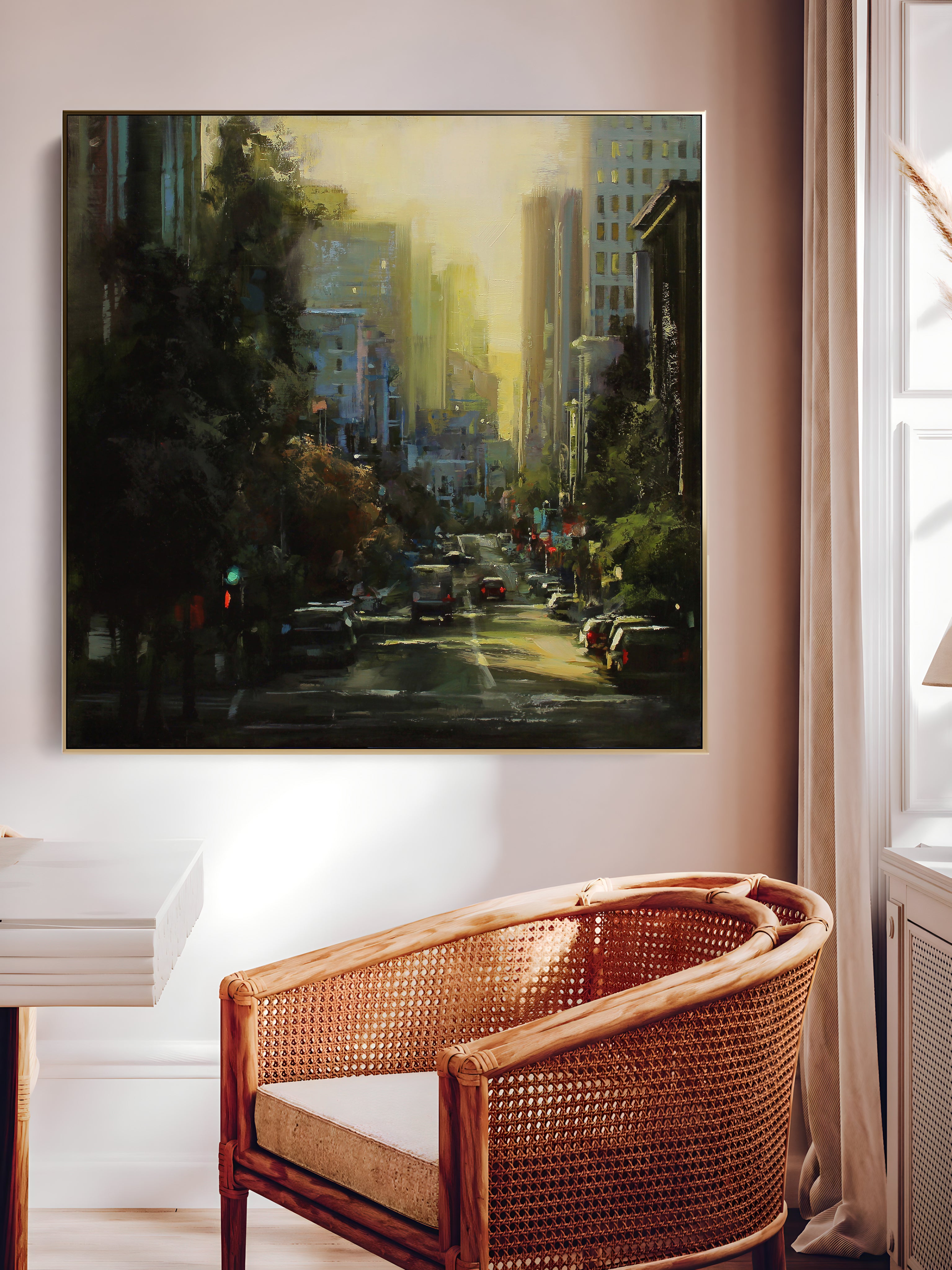 a painting hanging on a wall above a chair