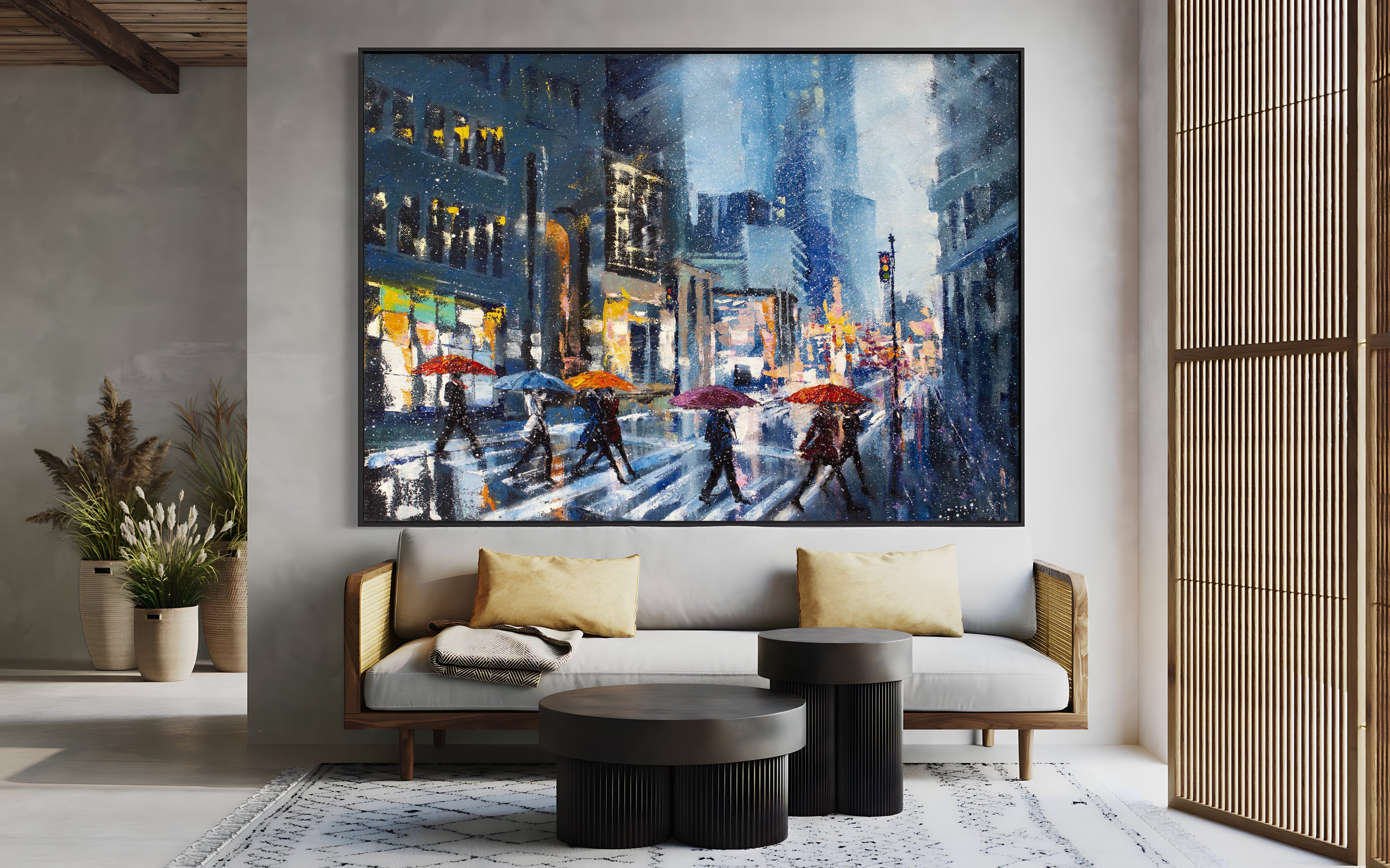 a living room with a couch and a painting on the wall