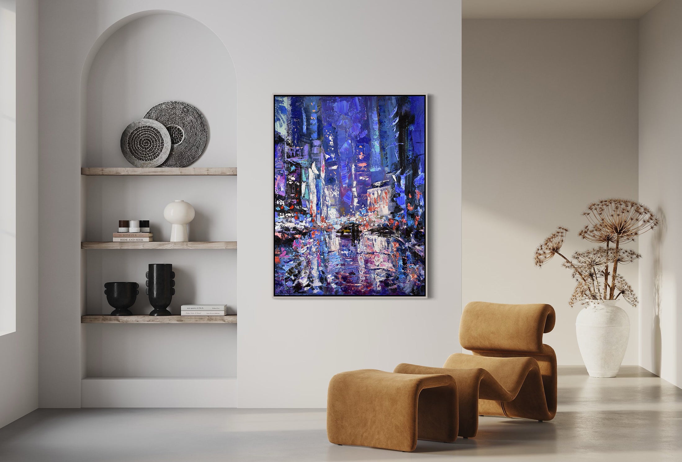 a living room with two chairs and a painting on the wall