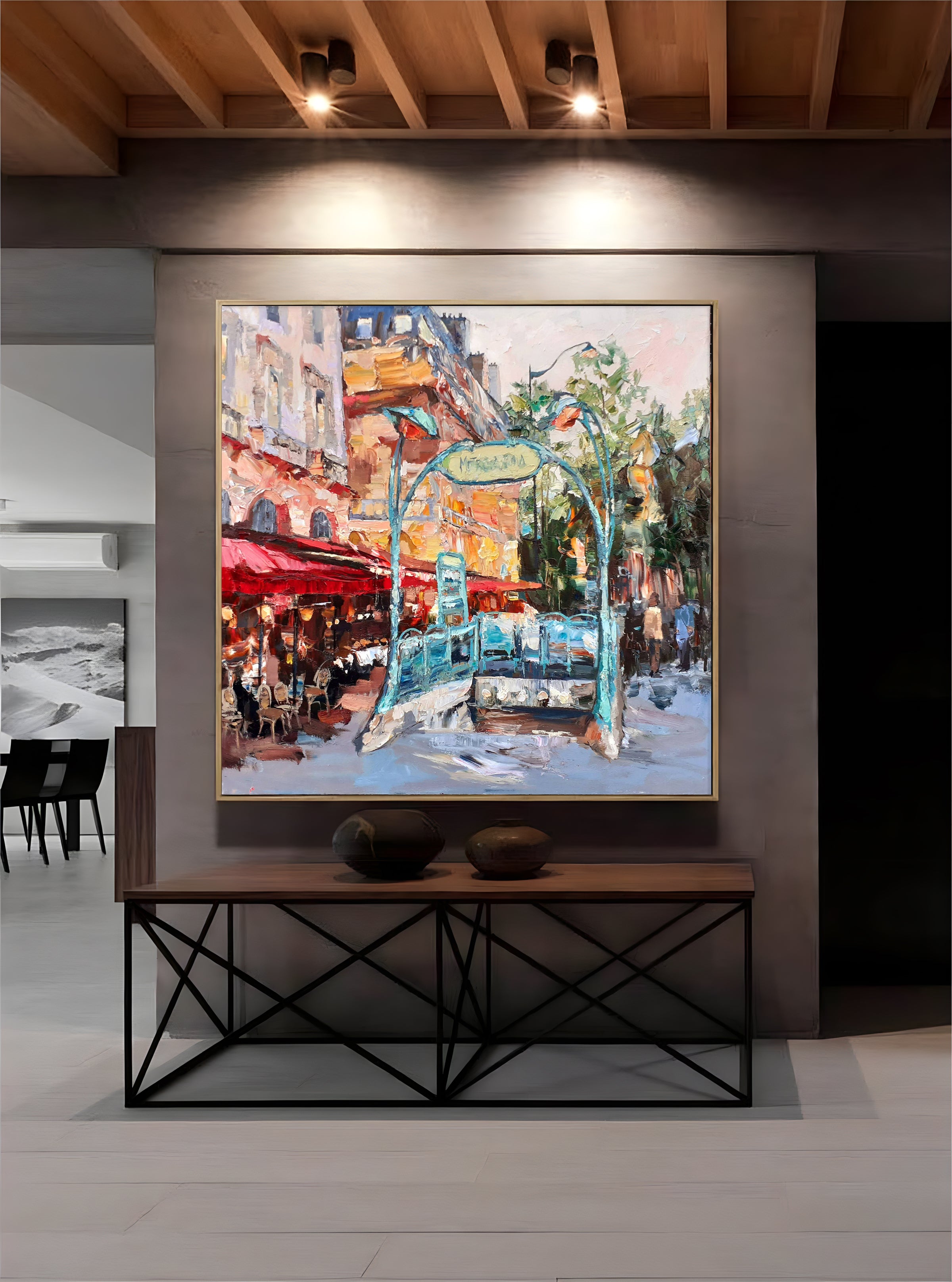 a painting hanging on a wall in a room