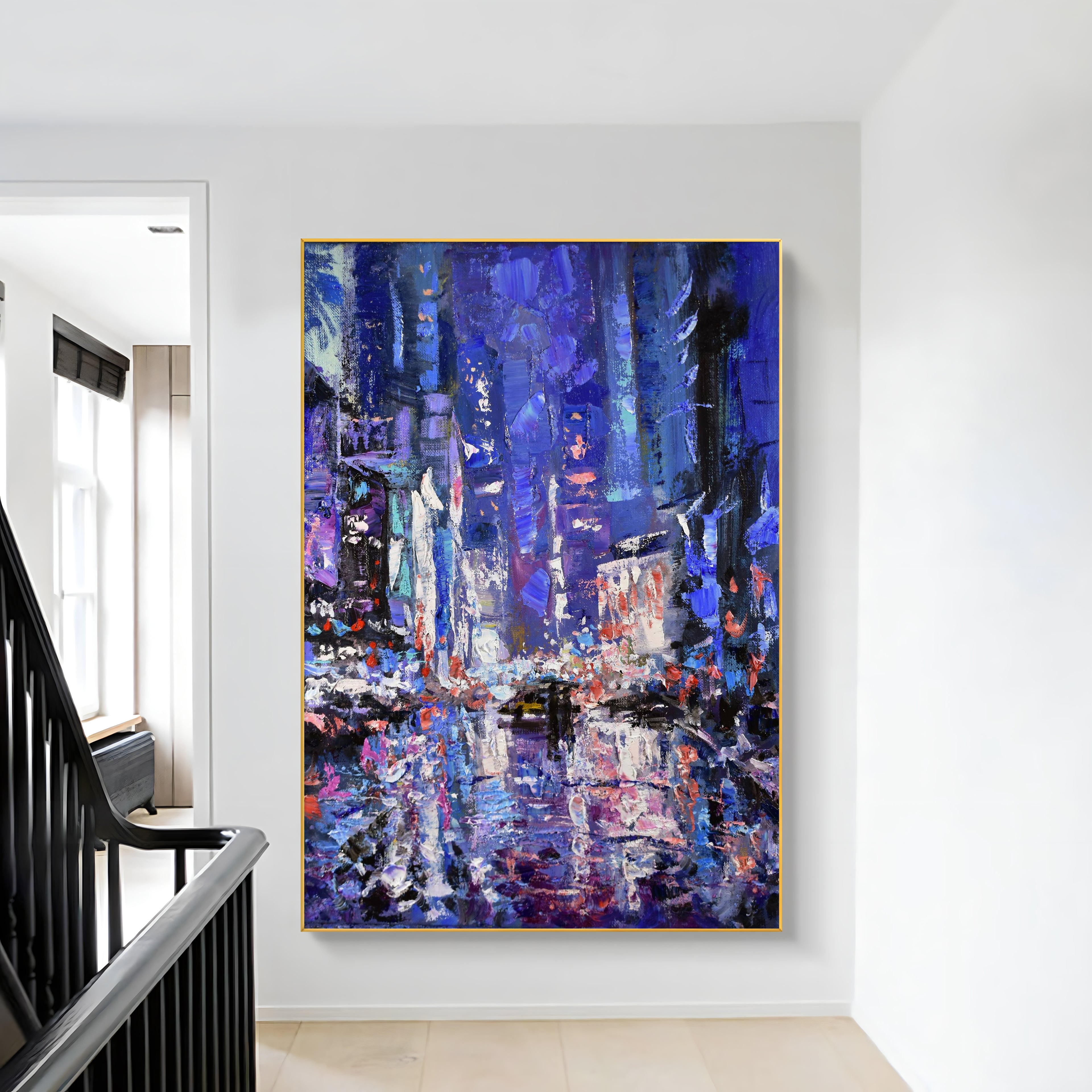 a painting hanging on a wall next to a banister