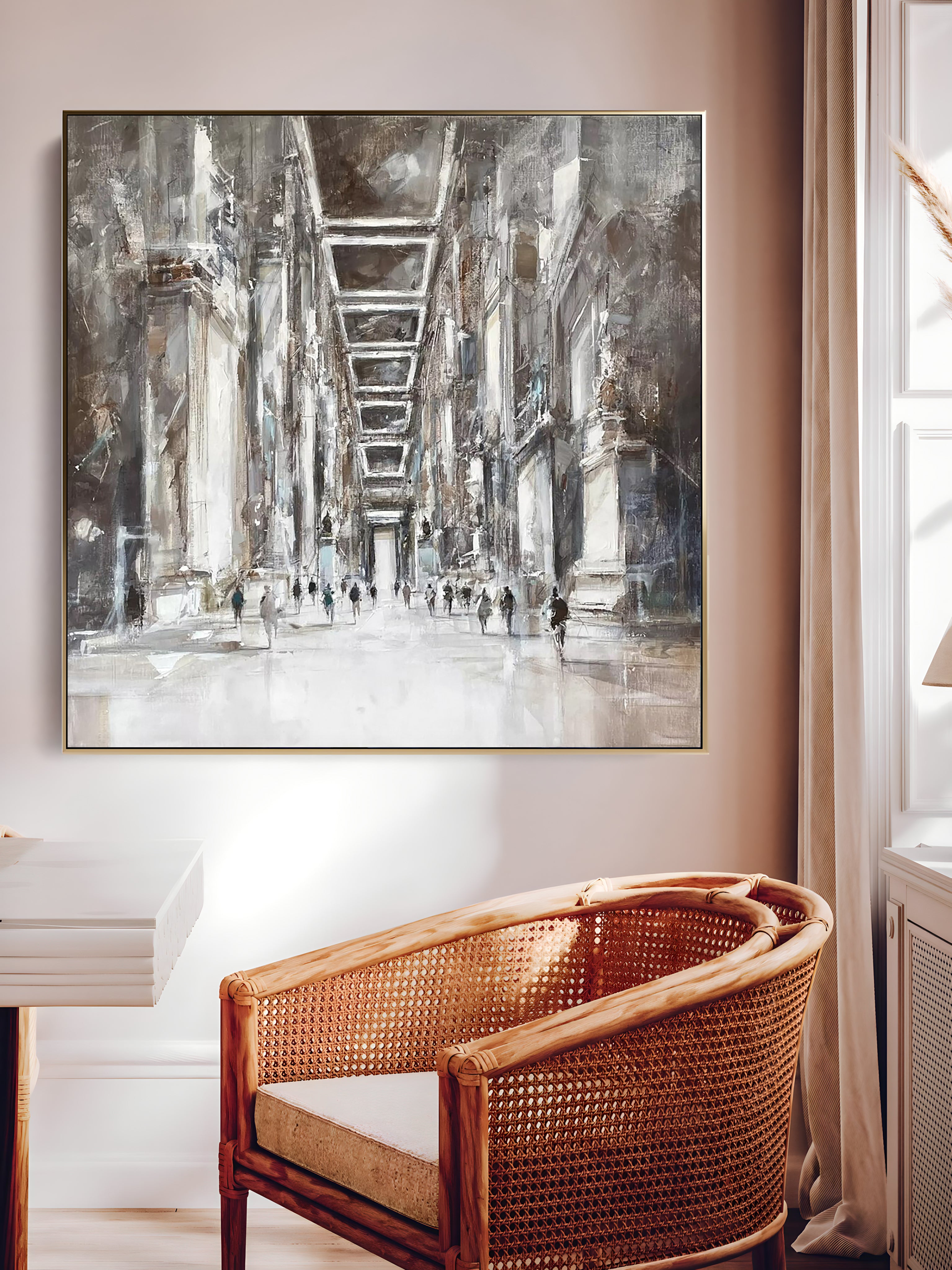 a painting hanging on a wall next to a chair