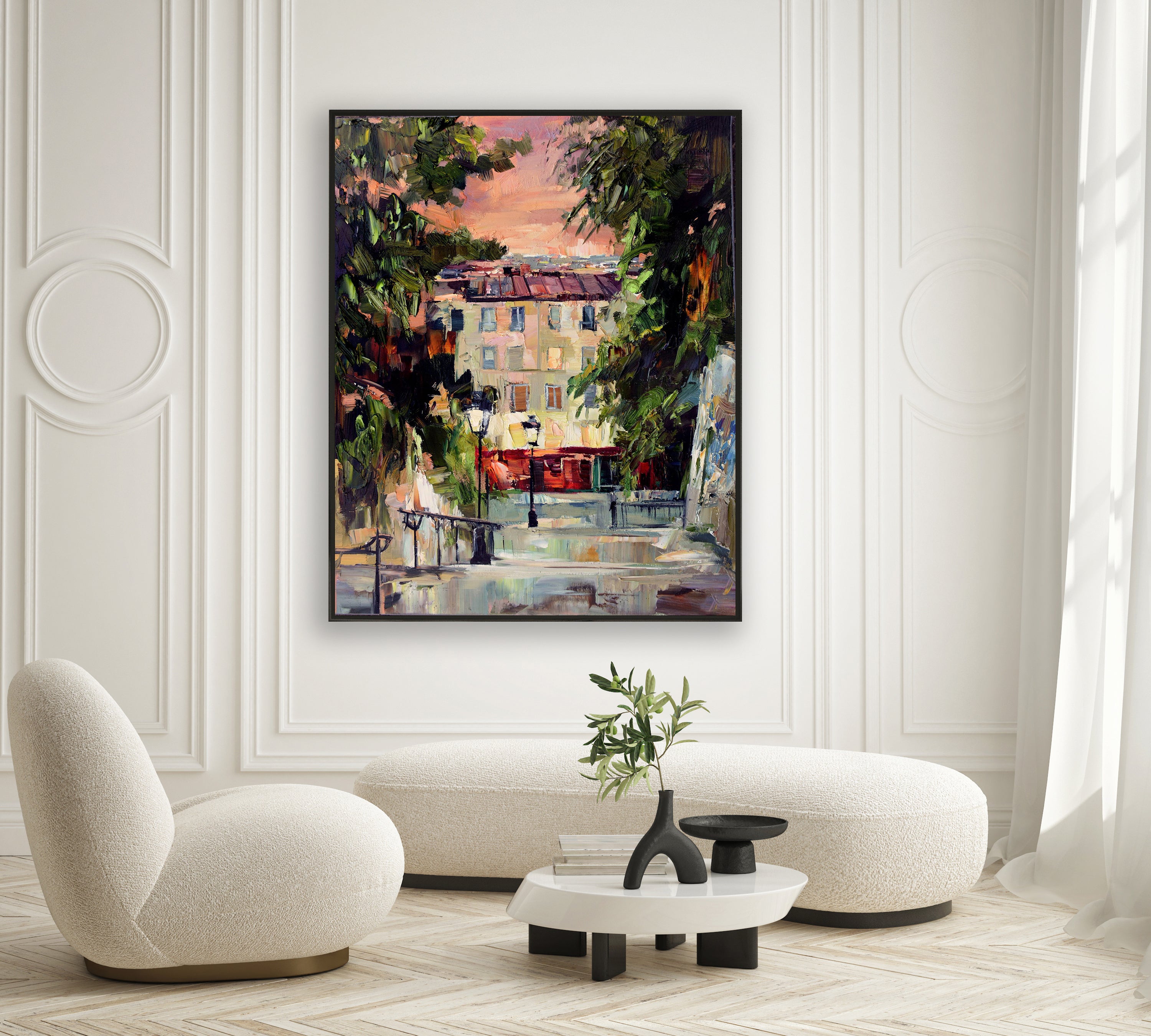 a living room with a painting on the wall