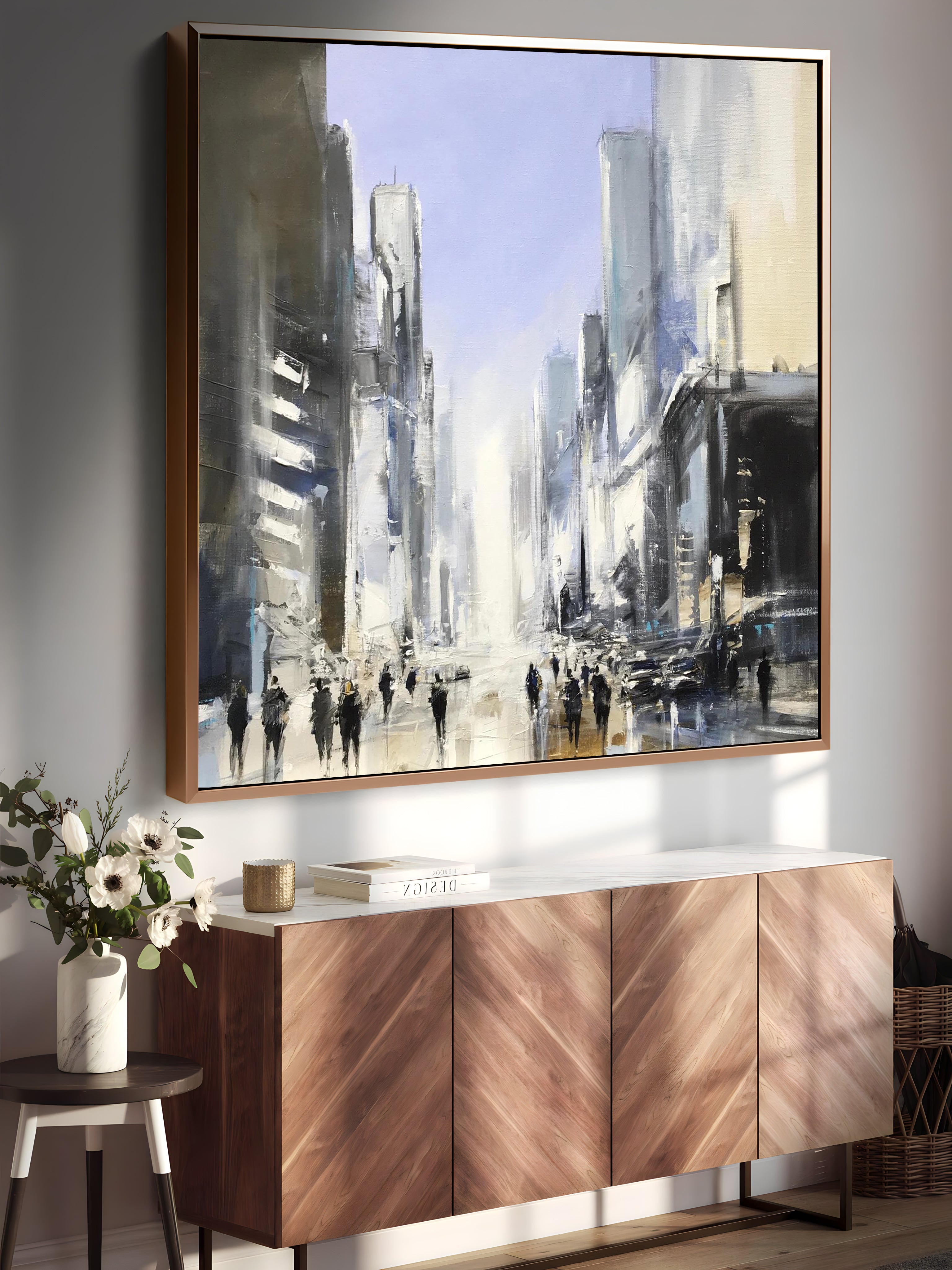 a painting hanging on a wall next to a sideboard