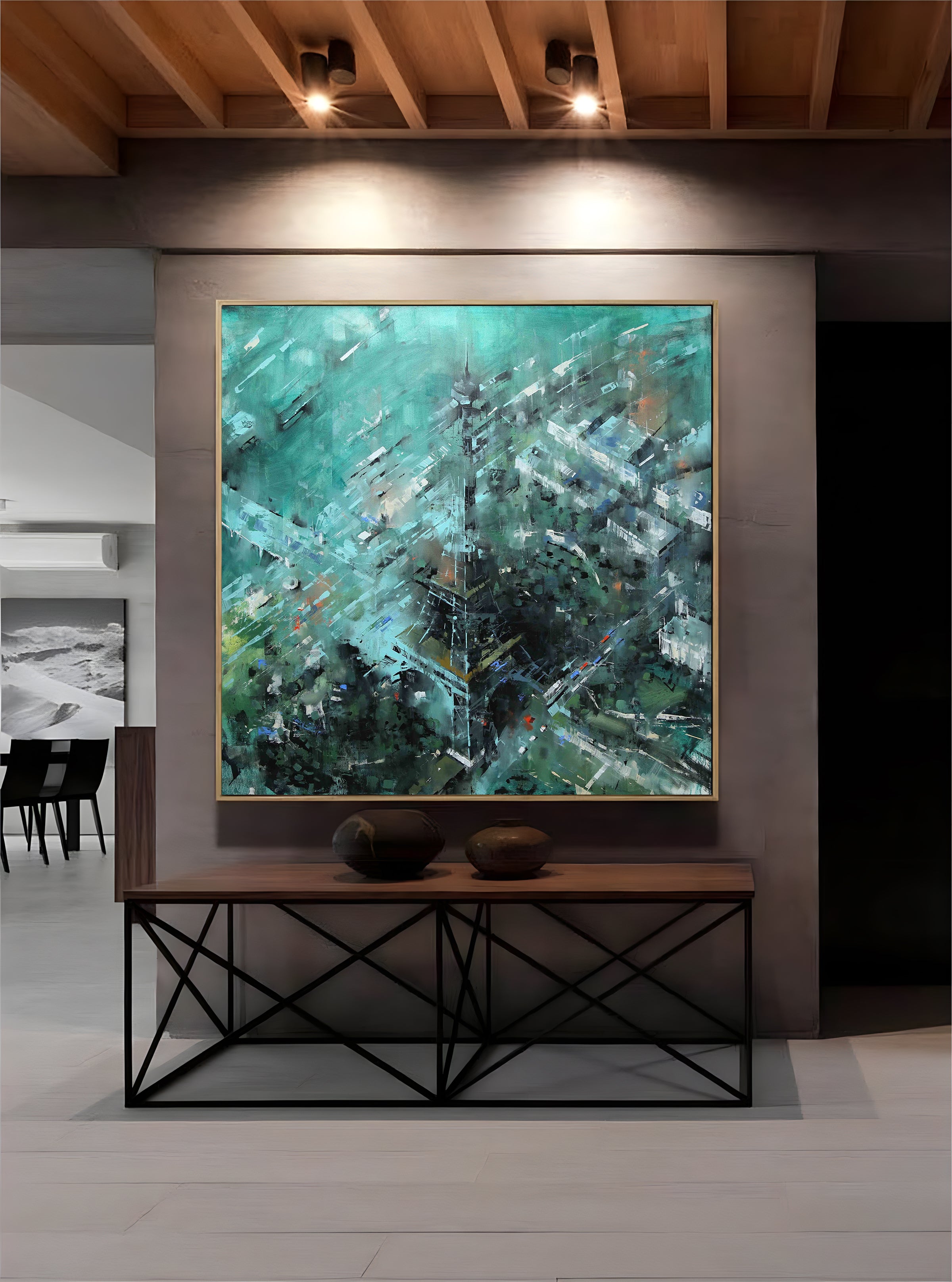 a painting hanging on a wall in a room