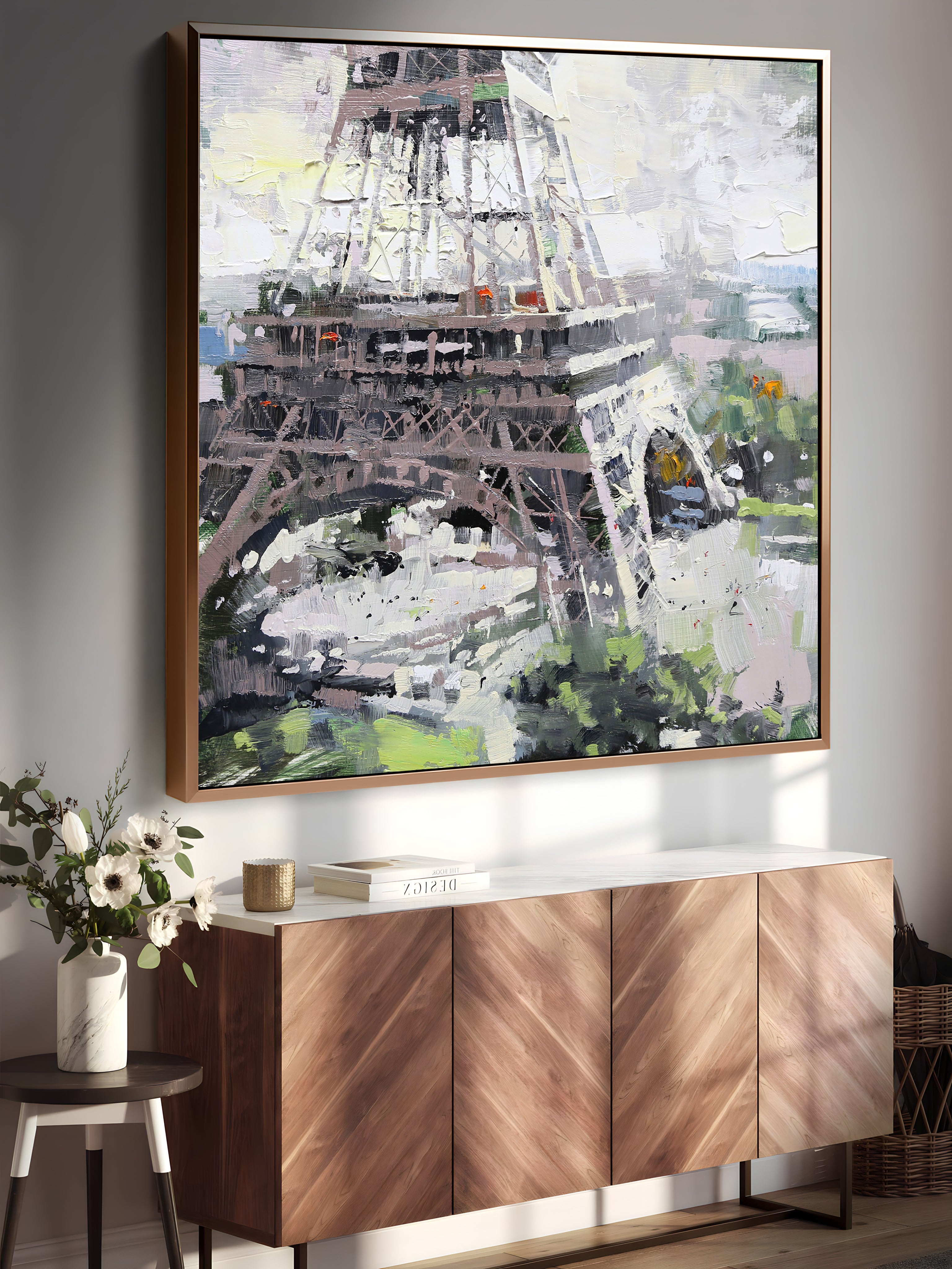 a painting of the eiffel tower on a wall