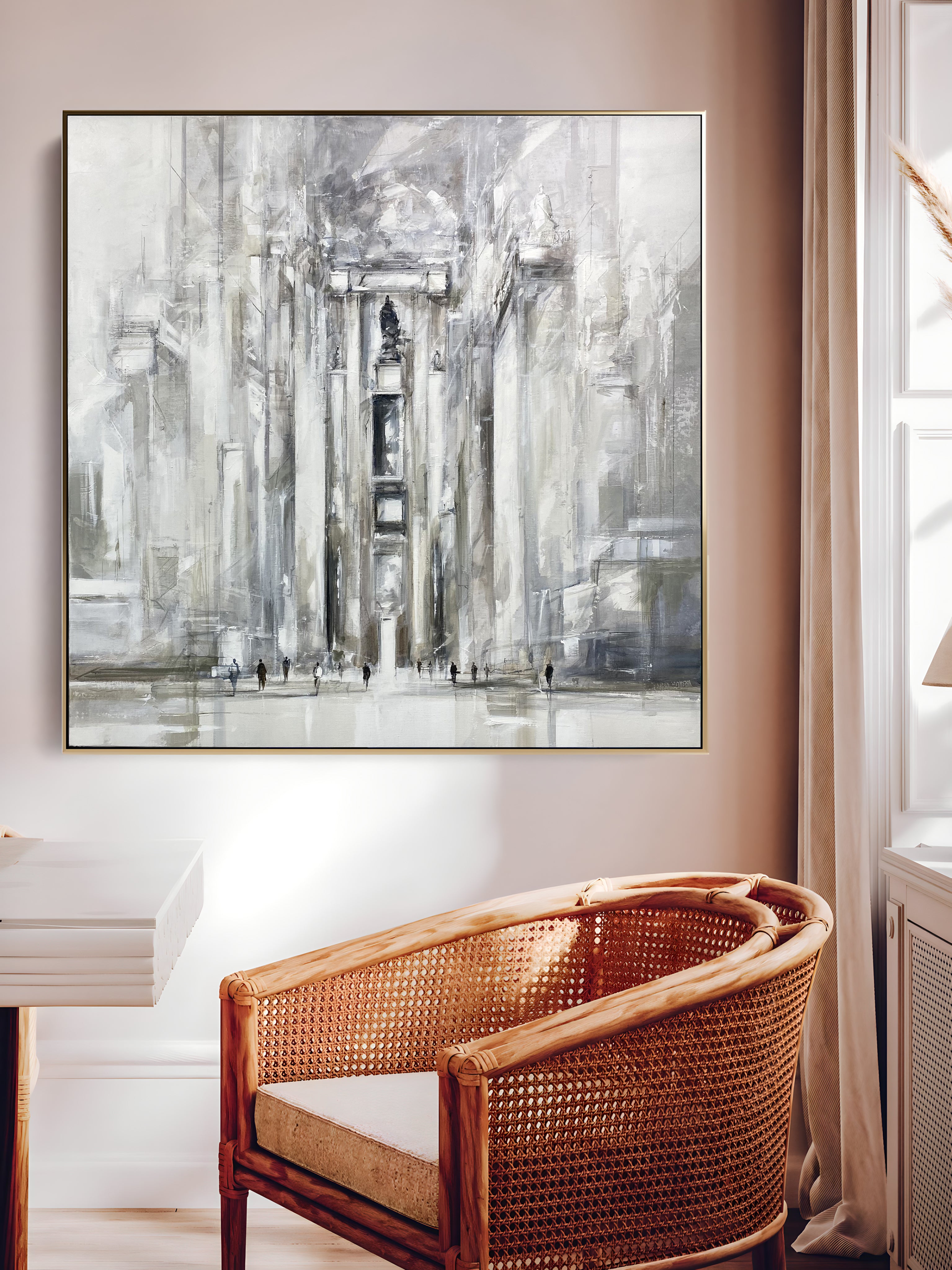 a painting hanging on a wall above a chair