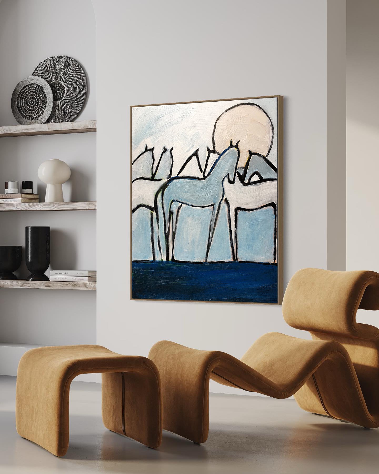 a living room with two chairs and a painting on the wall