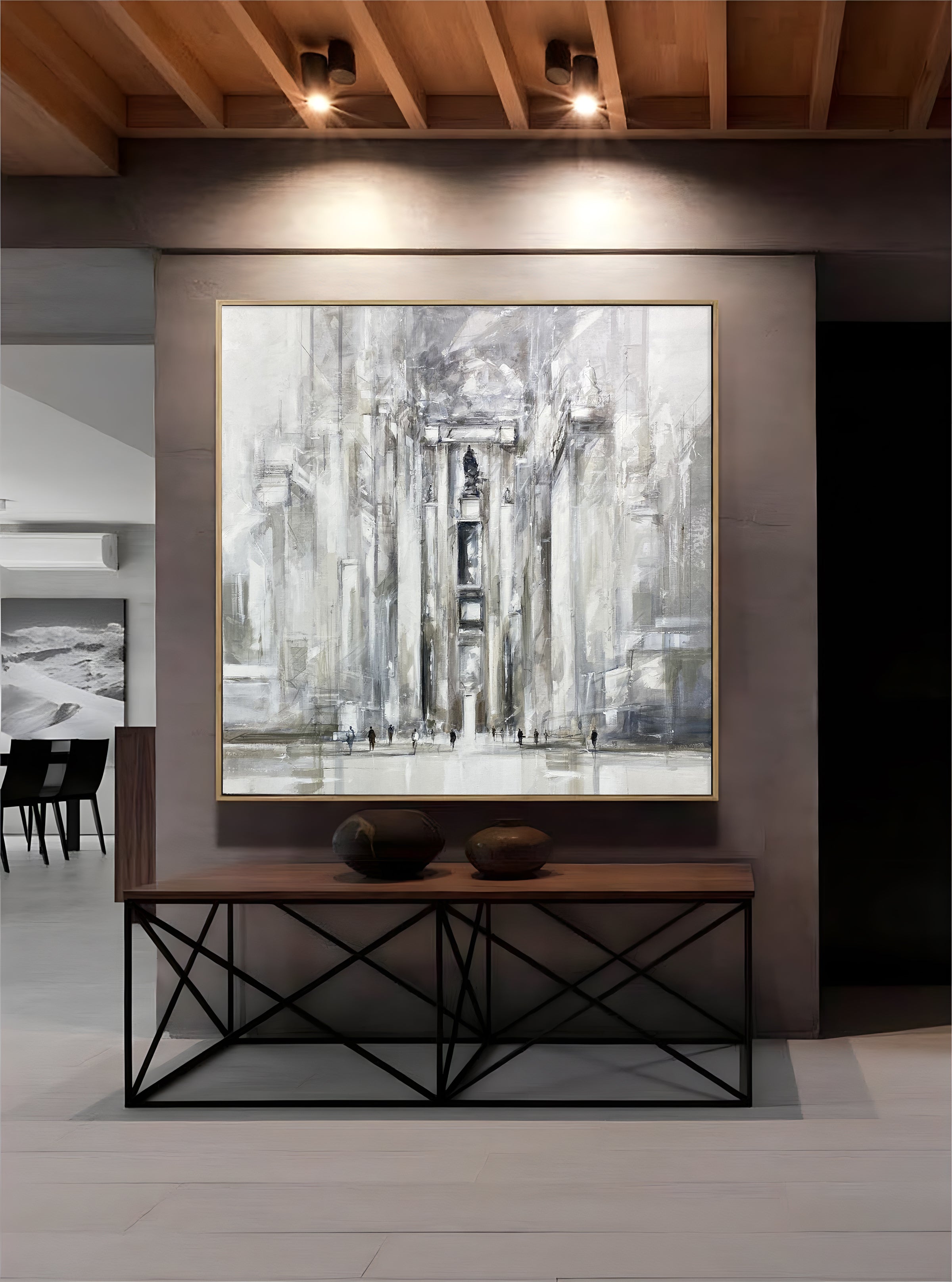 a painting hanging on a wall in a room