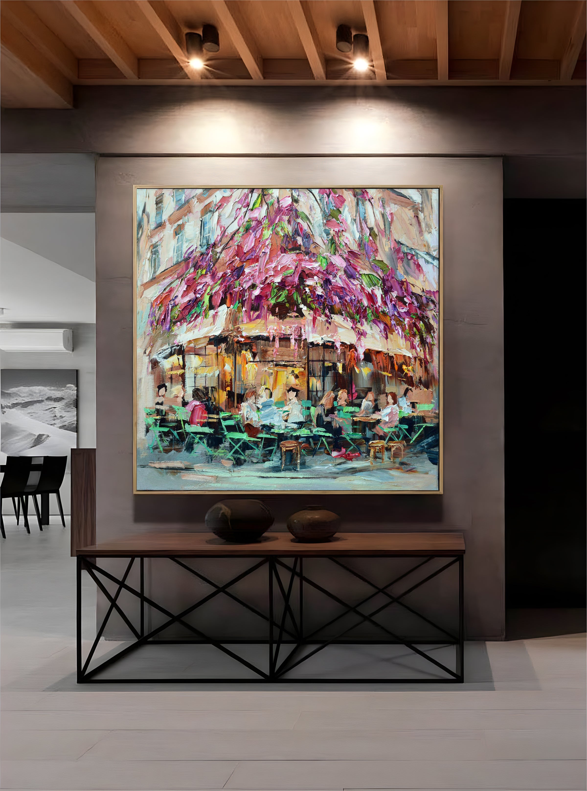 a painting hanging on a wall in a room