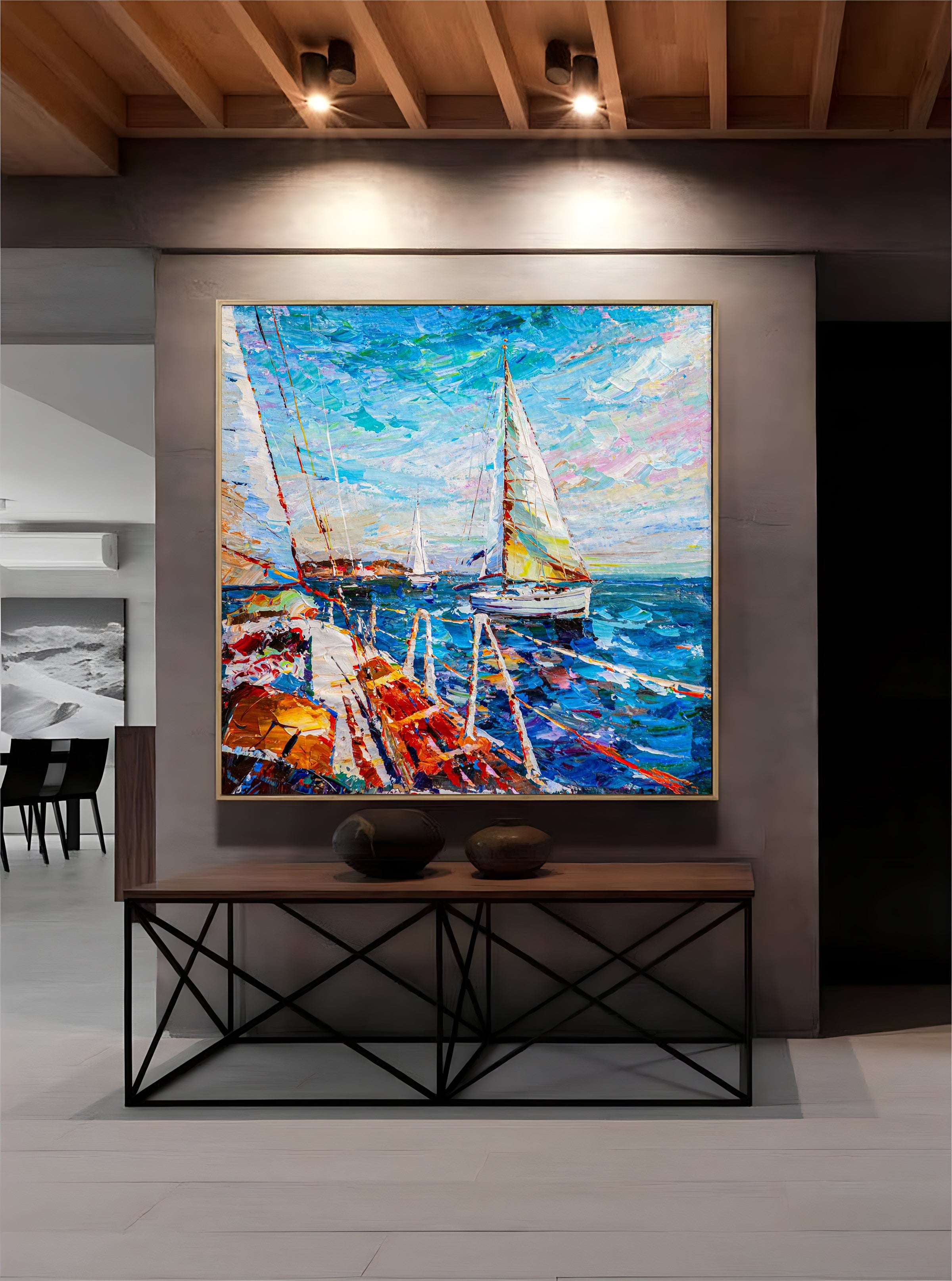a painting of a sailboat in a room