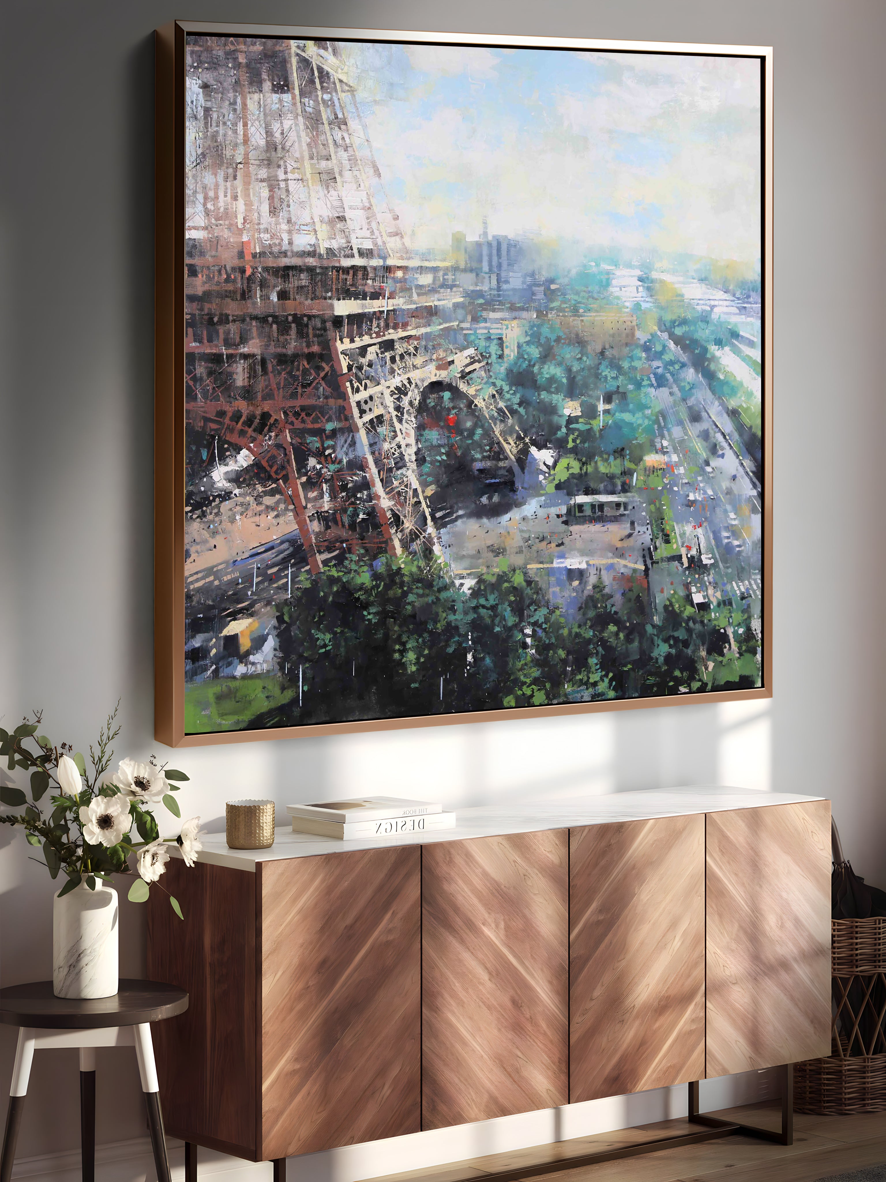 a painting of the eiffel tower hangs on a wall