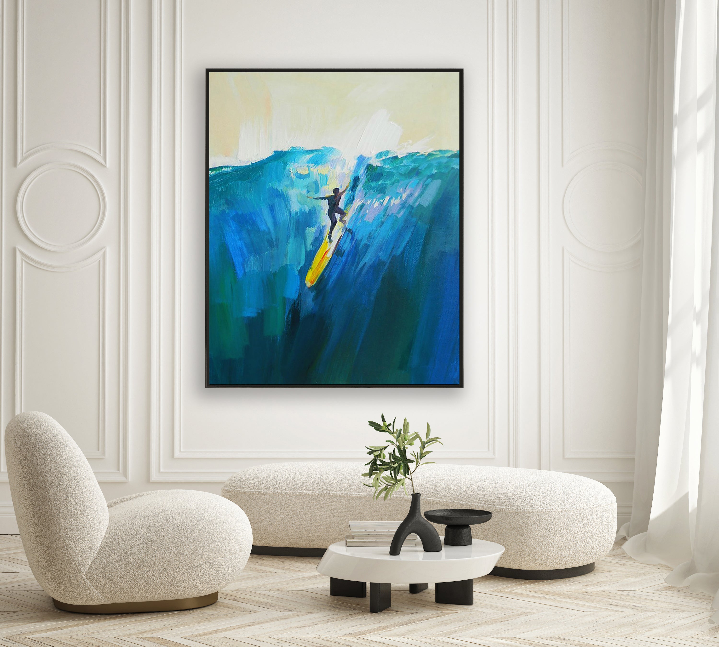 a living room with a painting on the wall