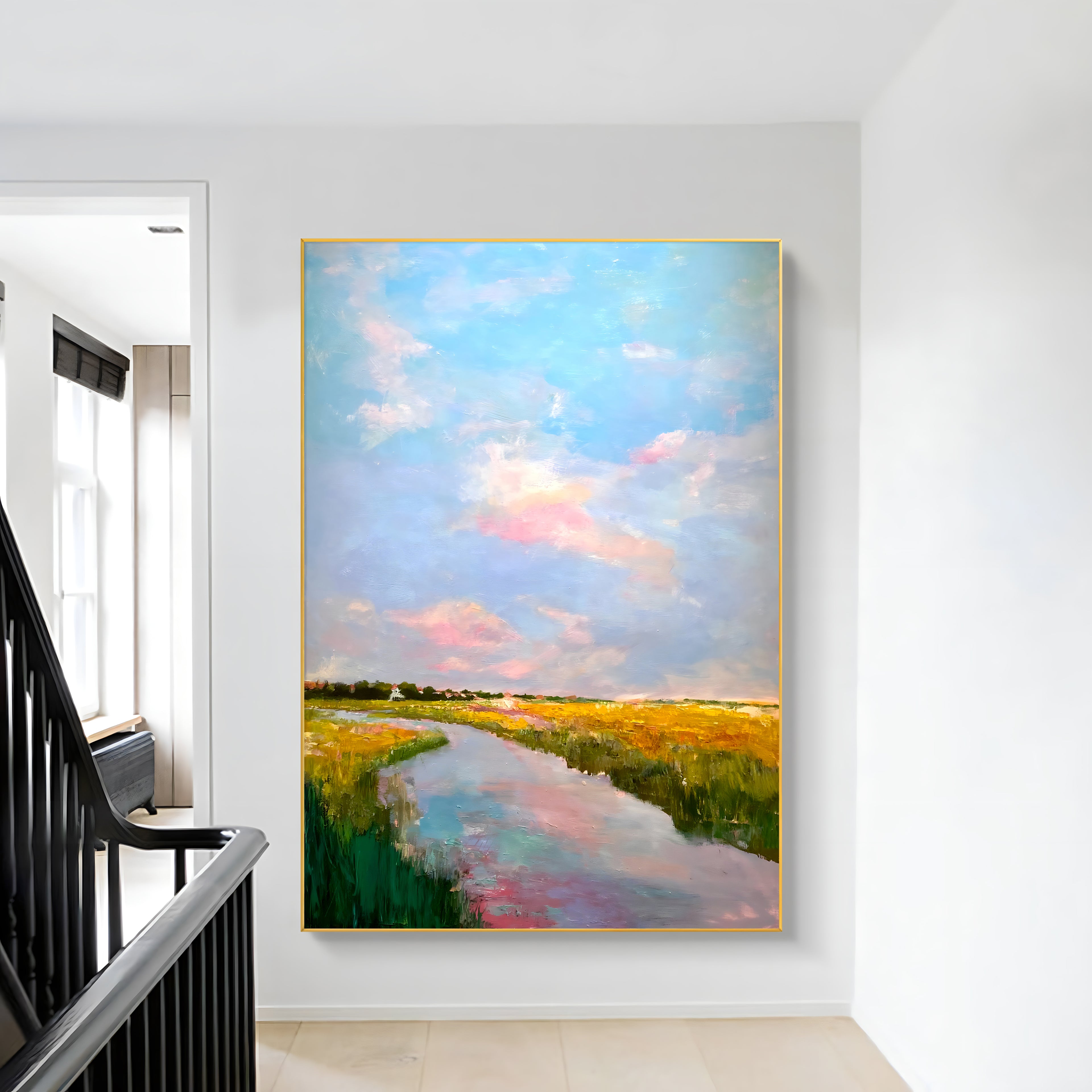 a painting hanging on a wall next to a stair case