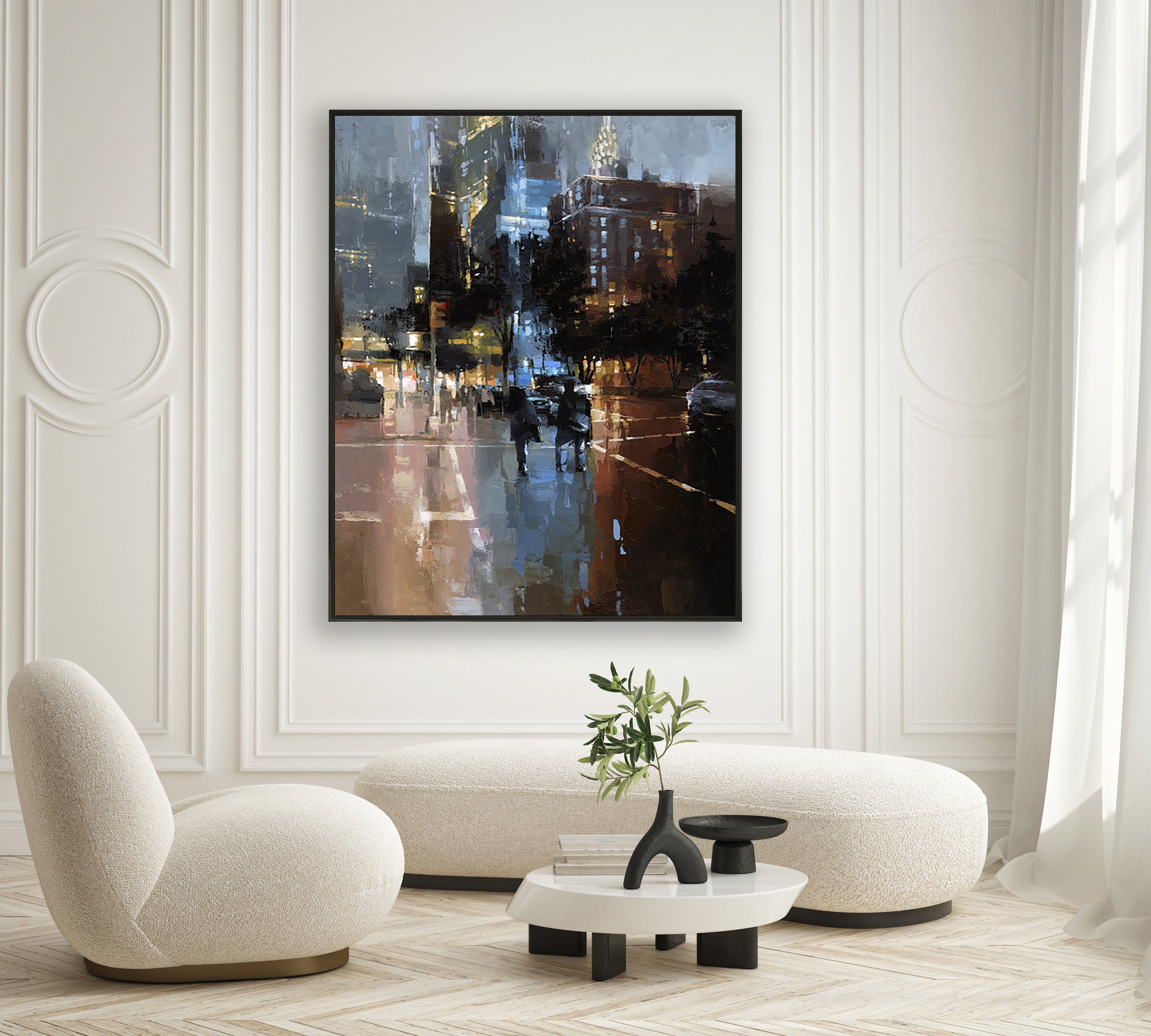 a living room with a painting on the wall