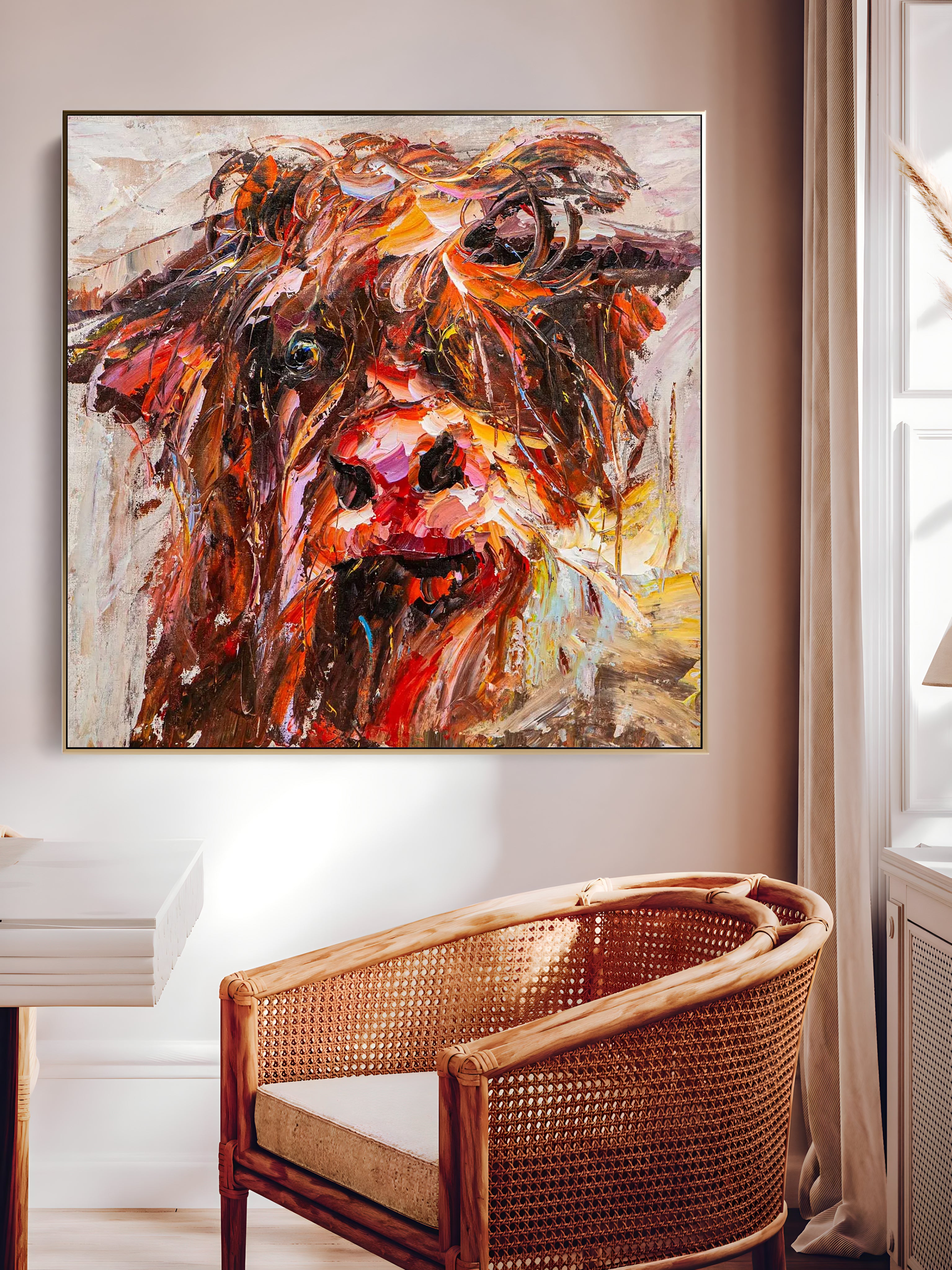 a painting of a cow in a living room