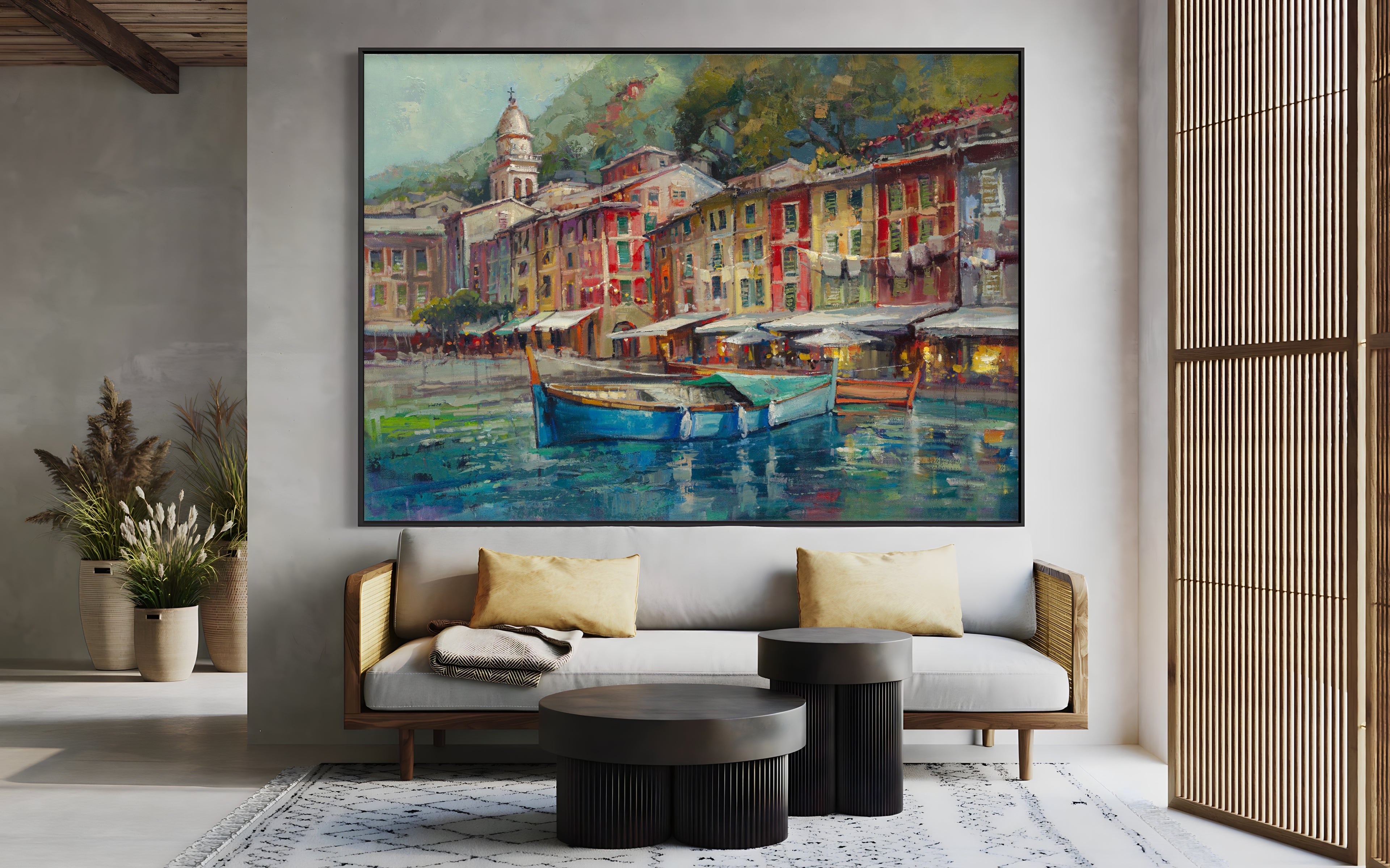 a living room with a couch and a painting on the wall