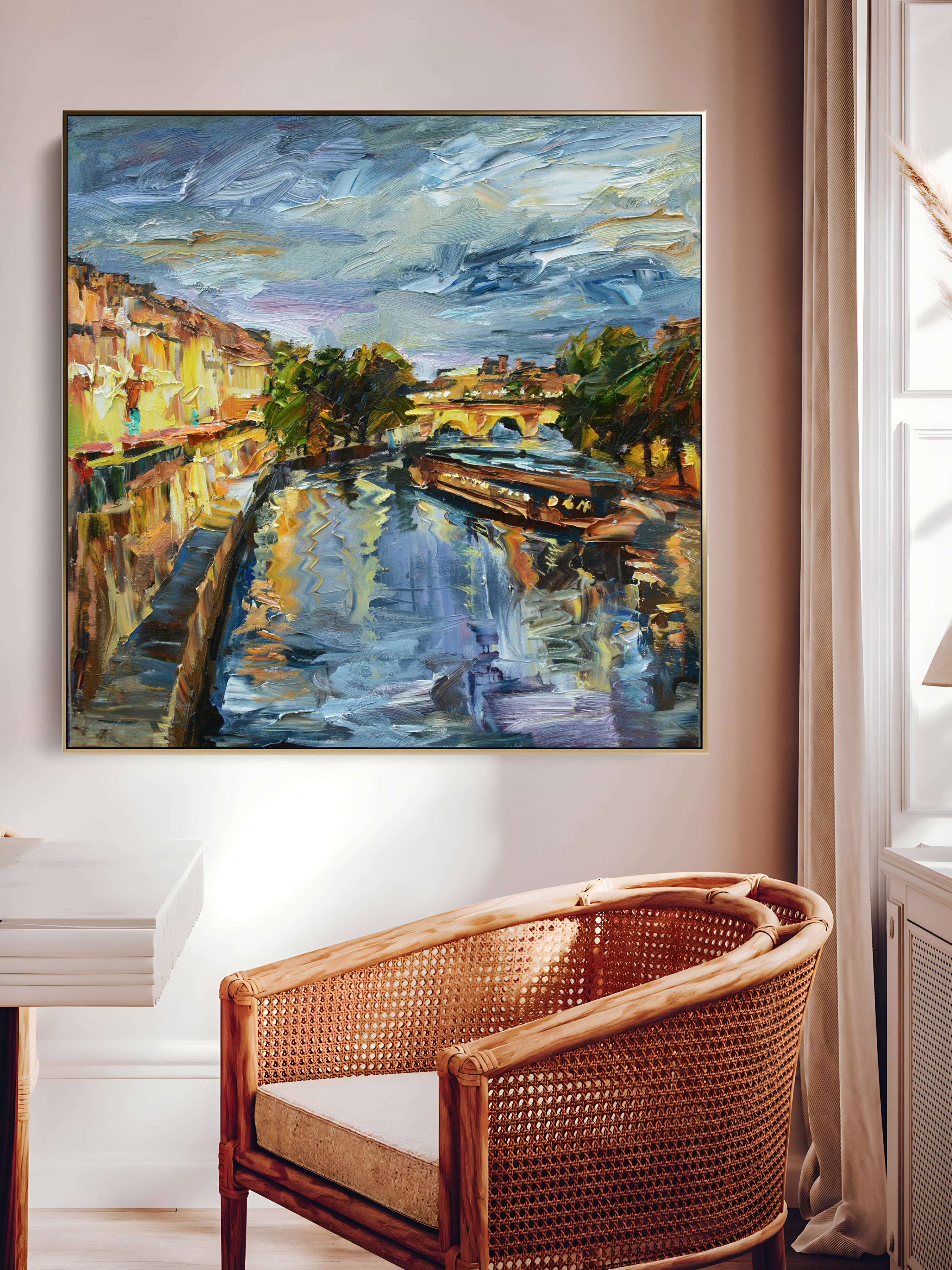 a painting on a wall above a chair