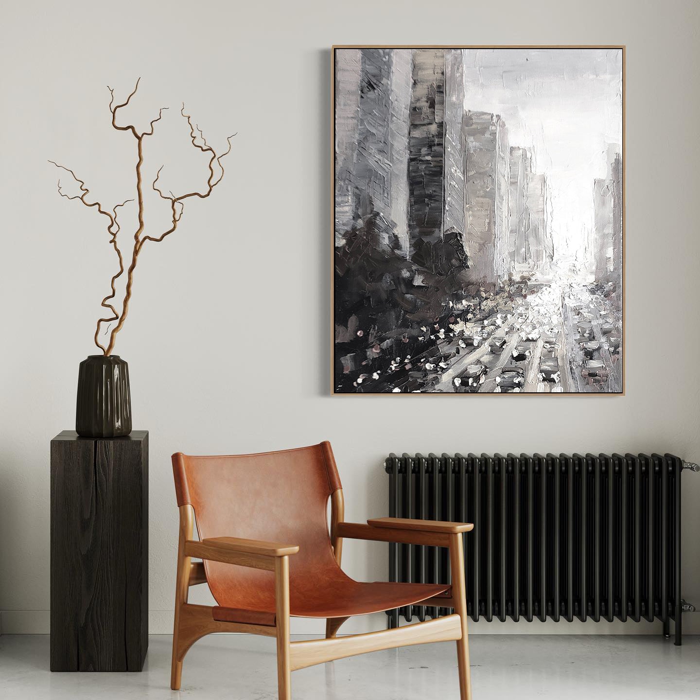 a chair in a room with a painting on the wall
