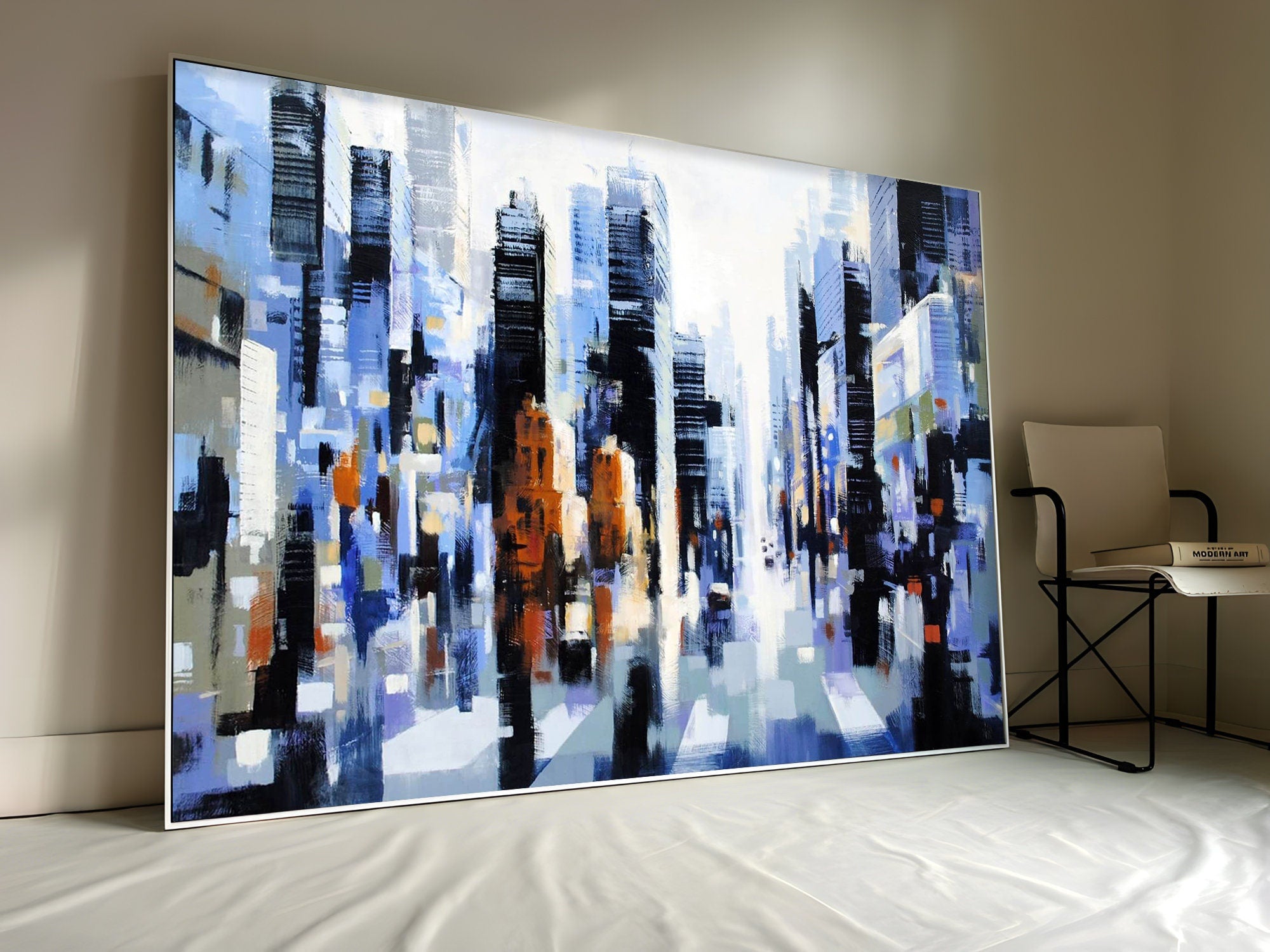 a painting of a cityscape with a chair in front of it