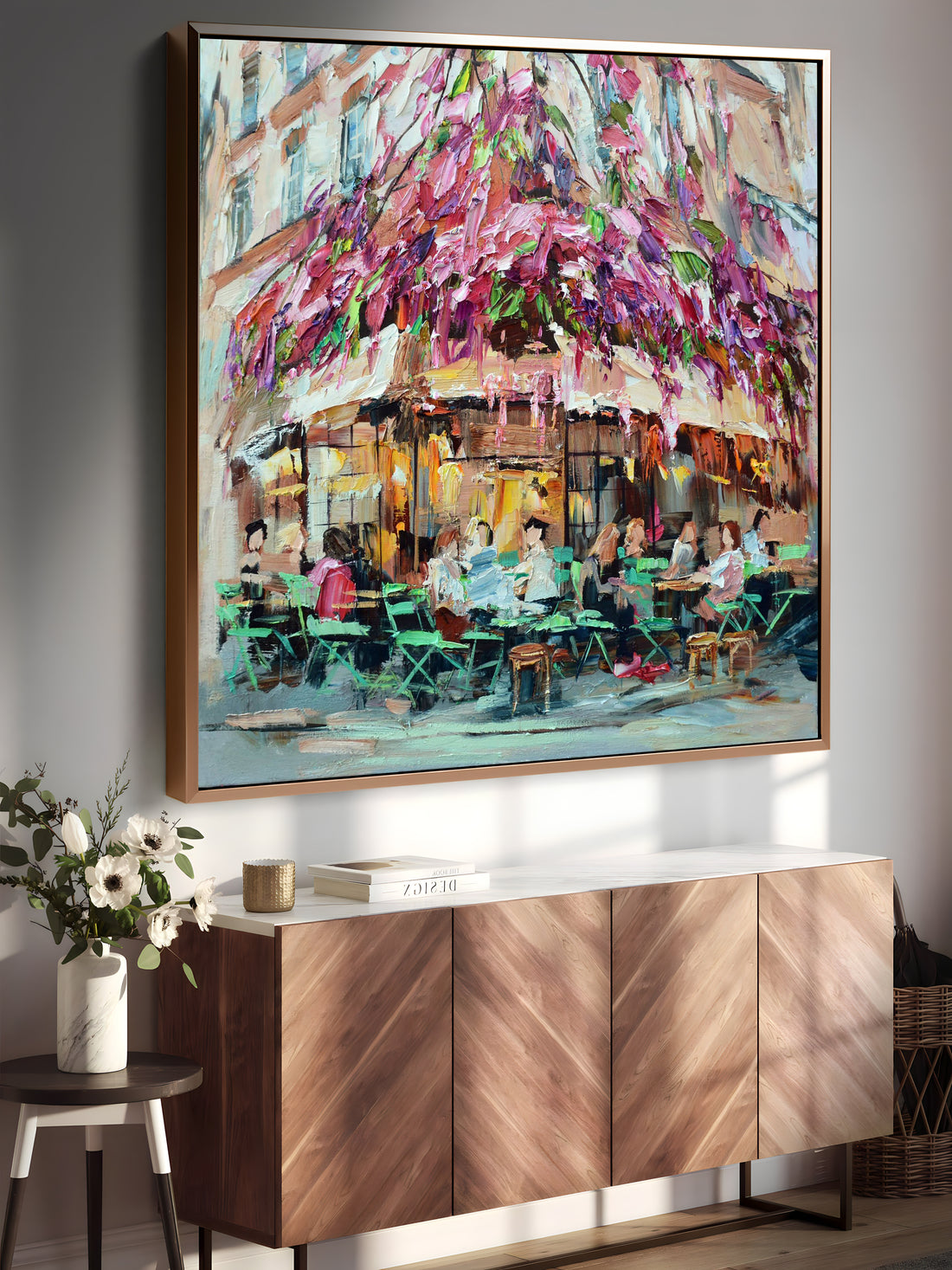 a painting hanging on a wall above a buffet