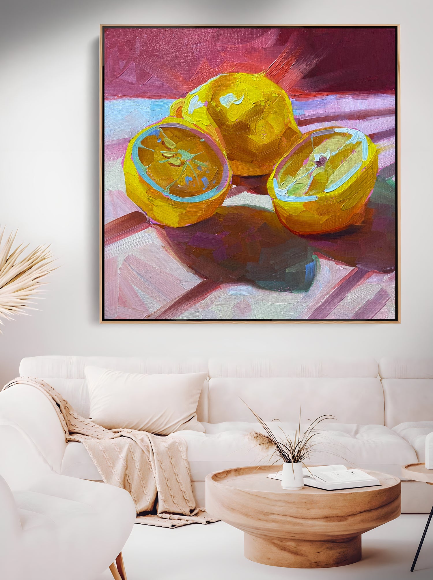 a painting of oranges on a table in a living room