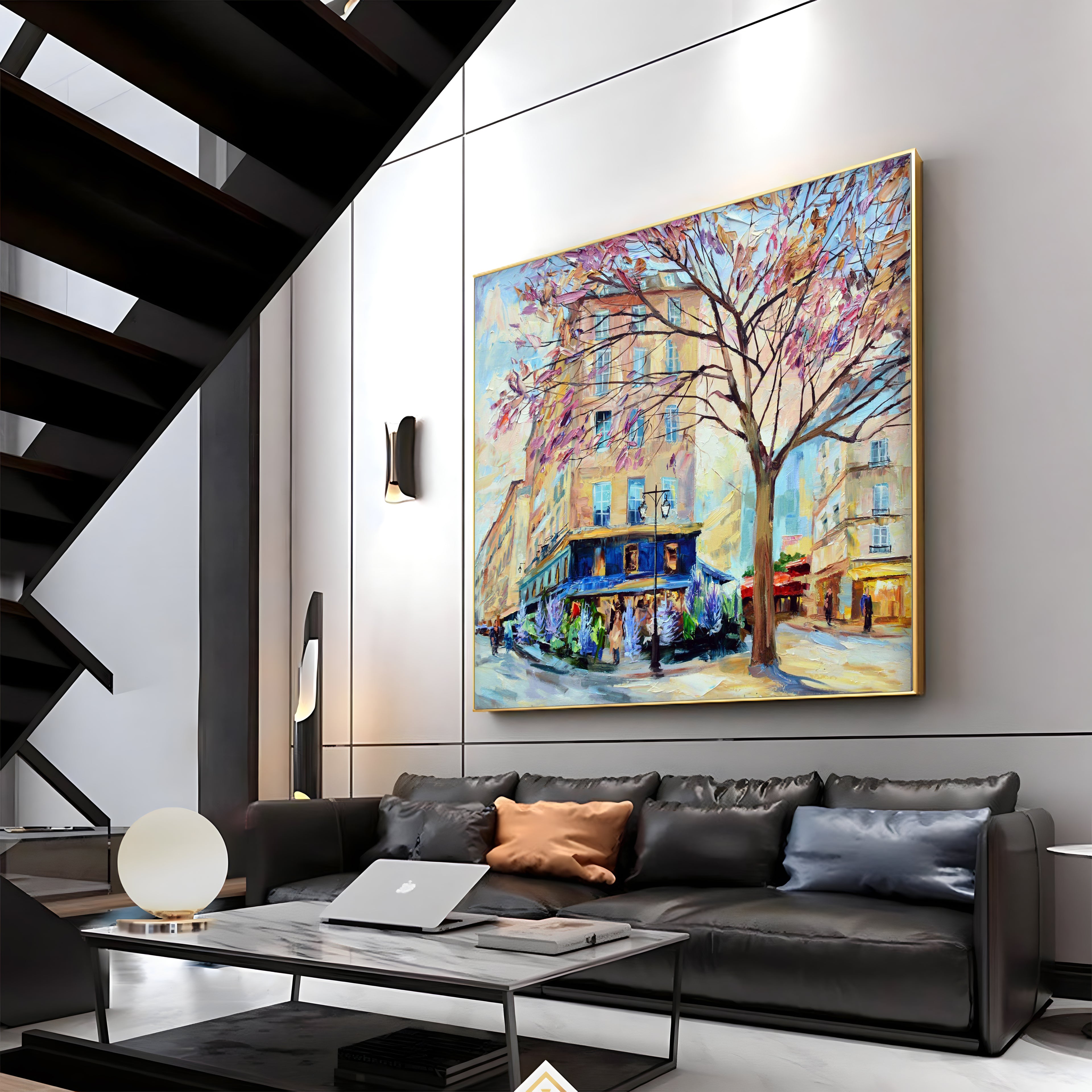 a living room with a couch and a painting on the wall