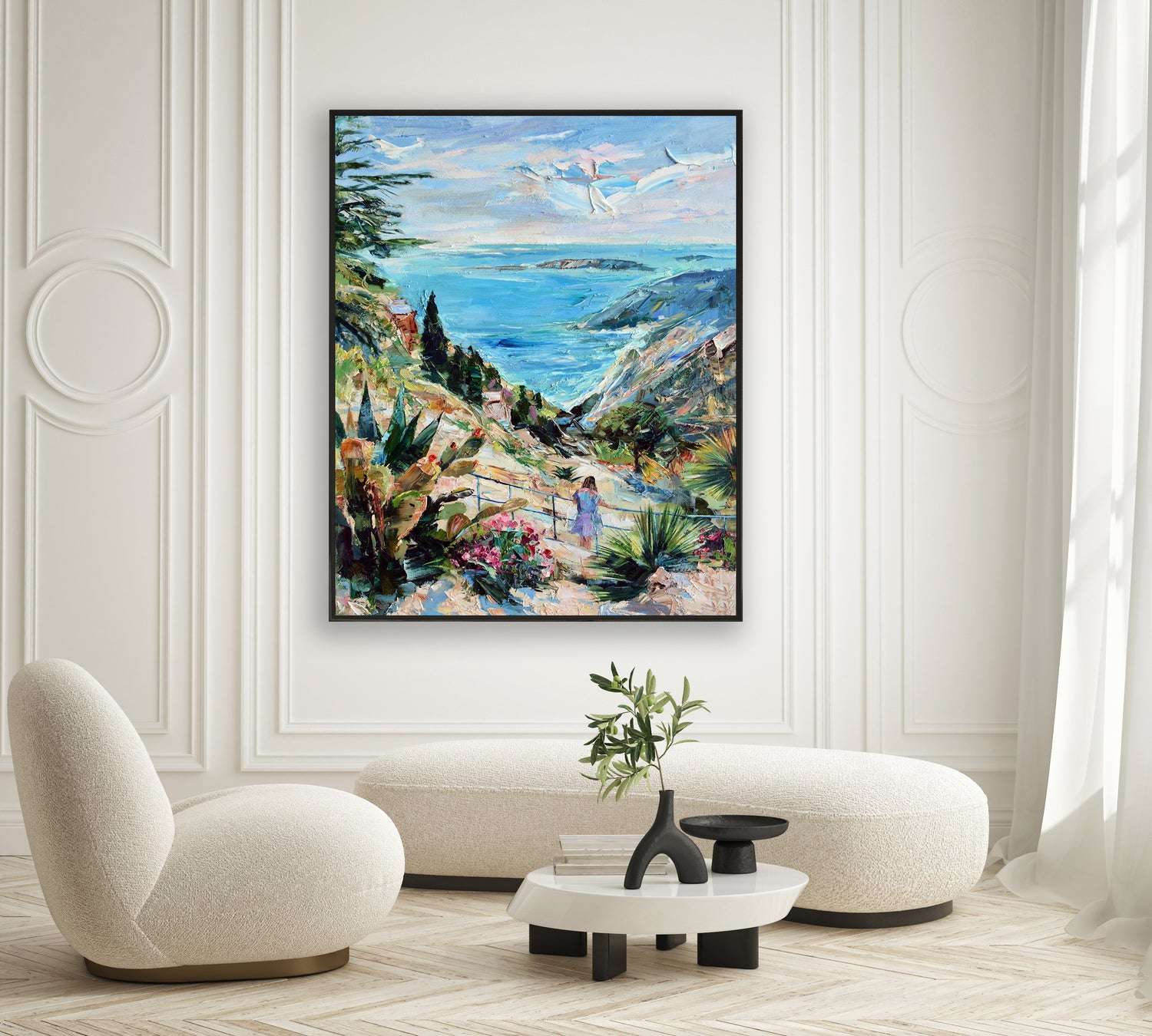 a living room with a painting on the wall