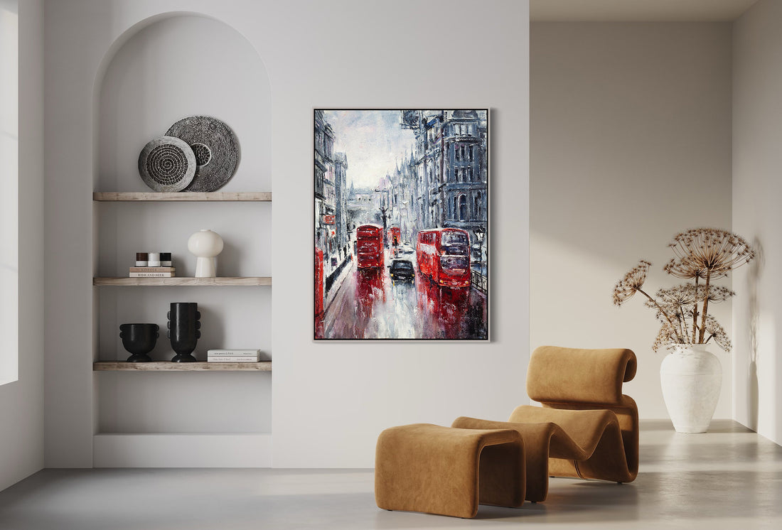 a living room with two chairs and a painting on the wall