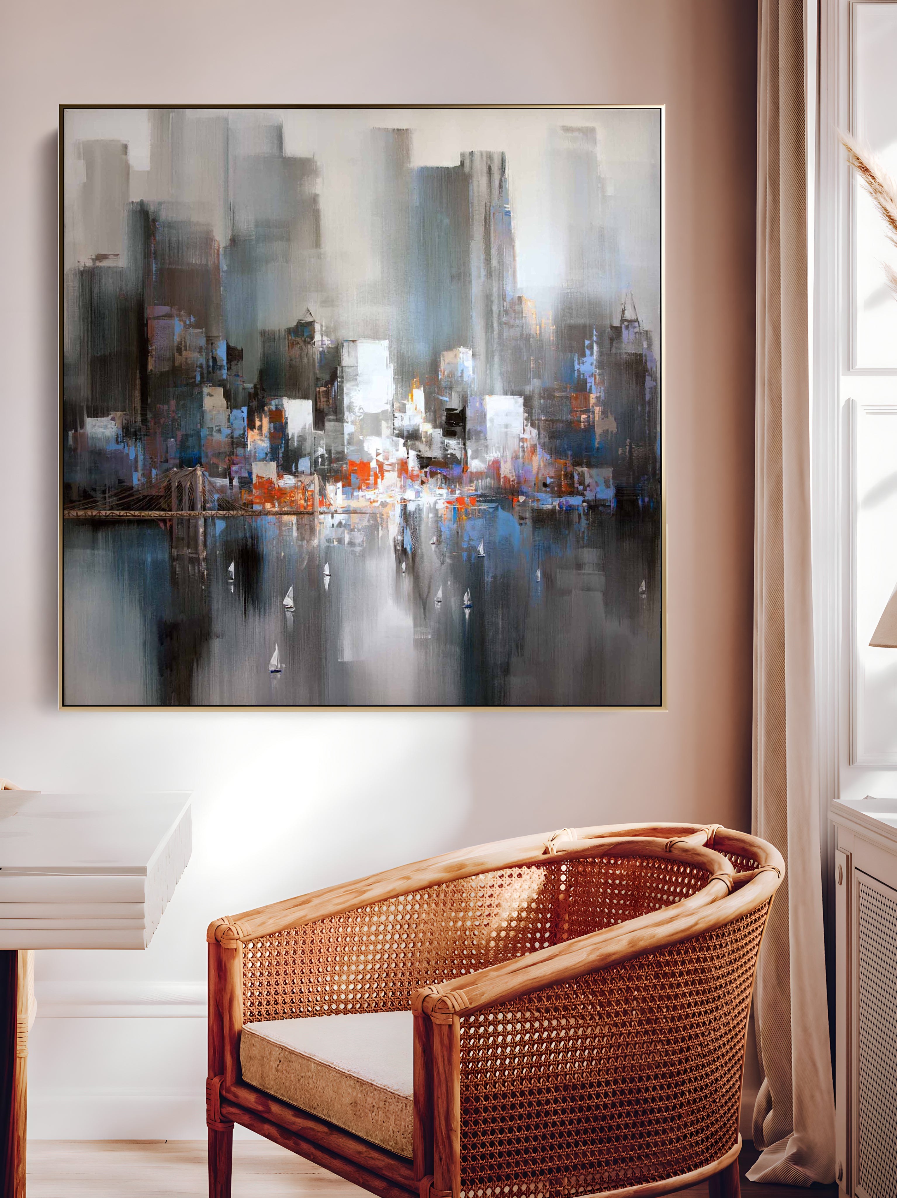 a painting hanging on a wall above a chair