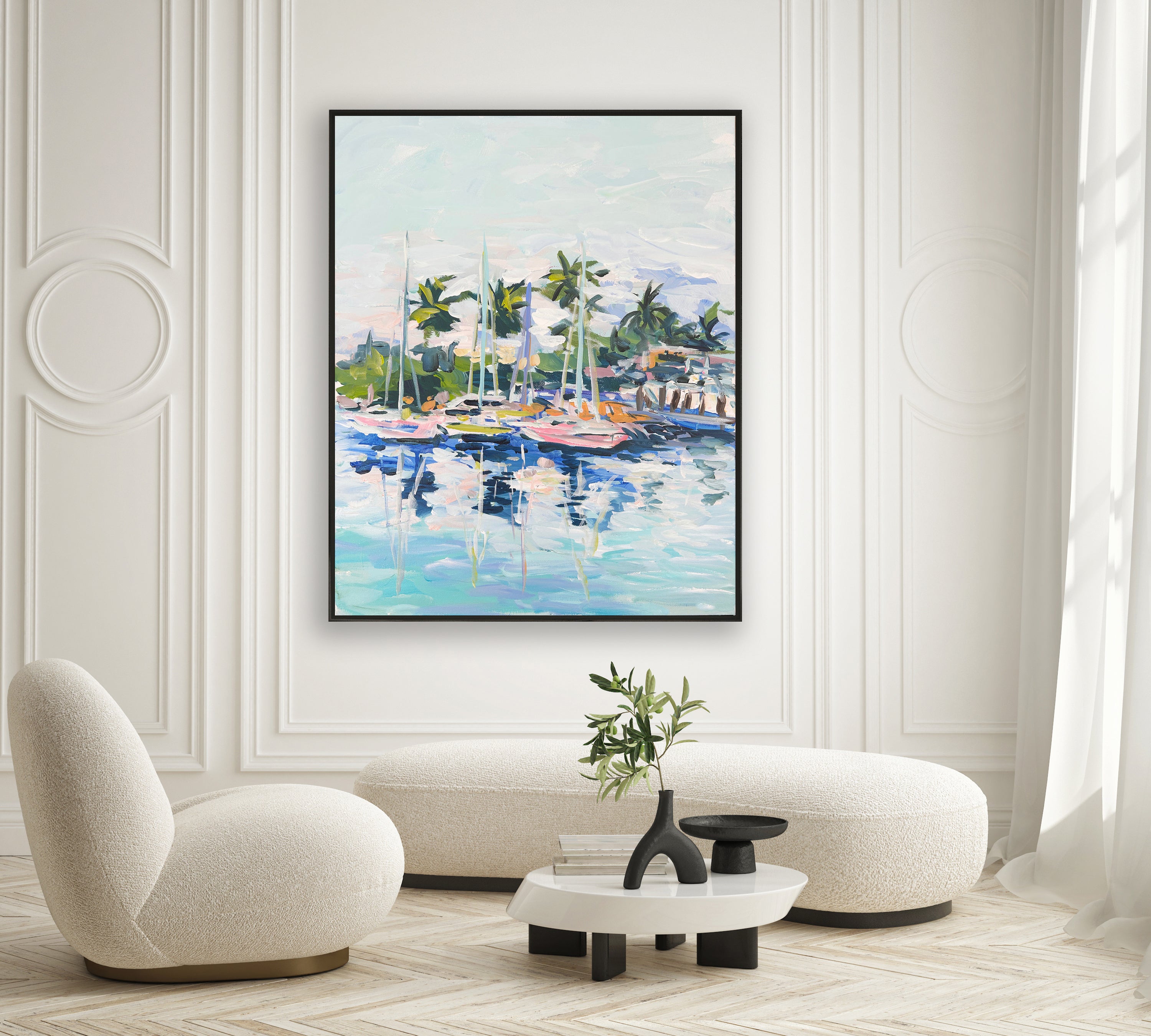 a living room with a painting on the wall