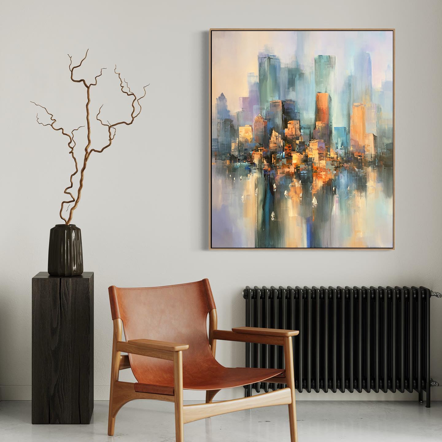 a painting hanging on a wall next to a chair