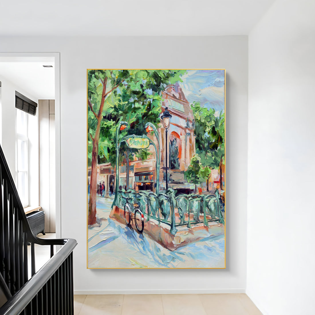 a painting hanging on a wall next to a banister