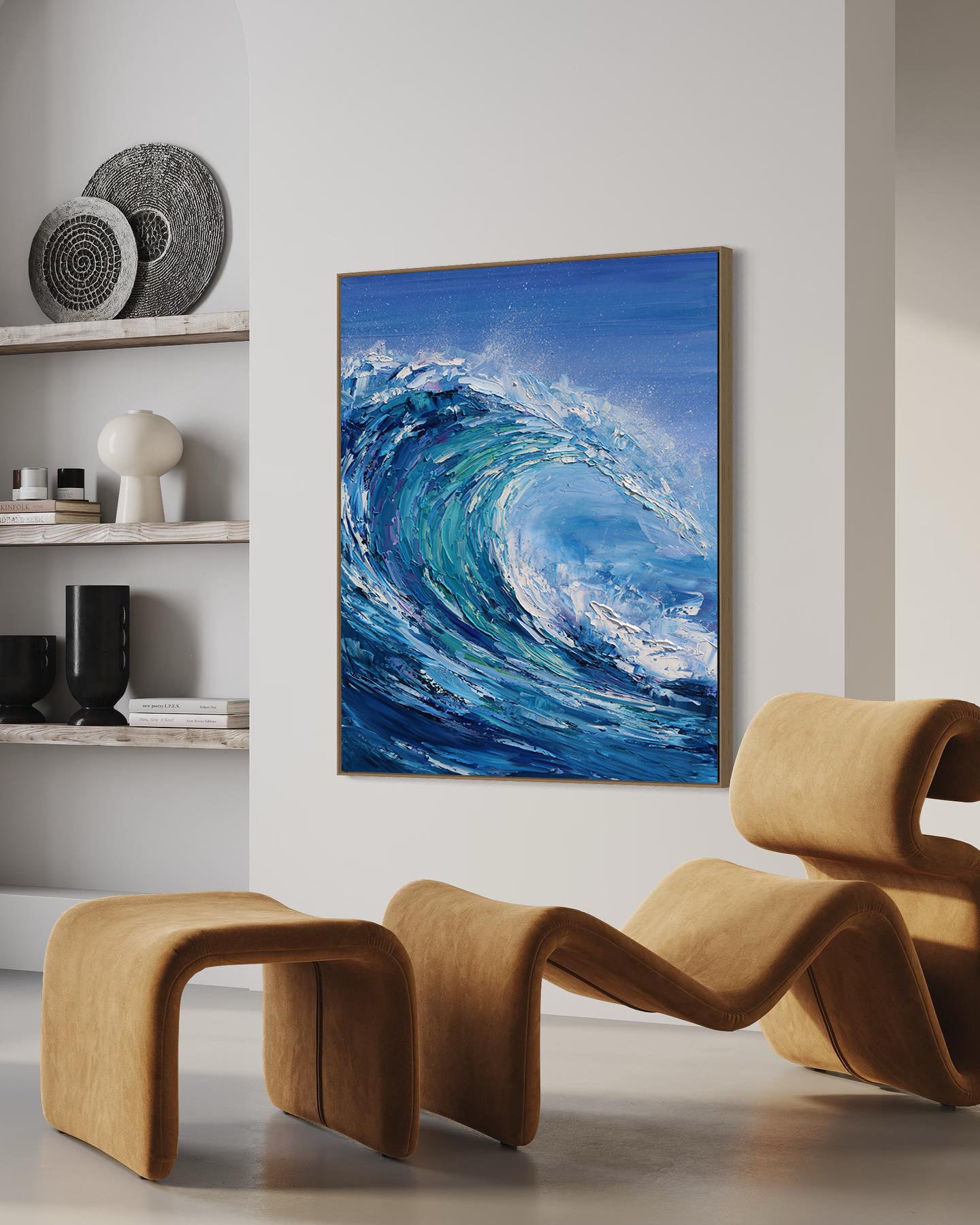 a painting of a blue ocean wave in a living room