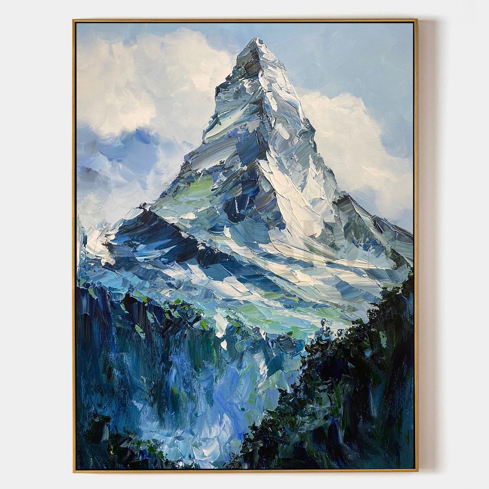 a painting of a mountain in a frame