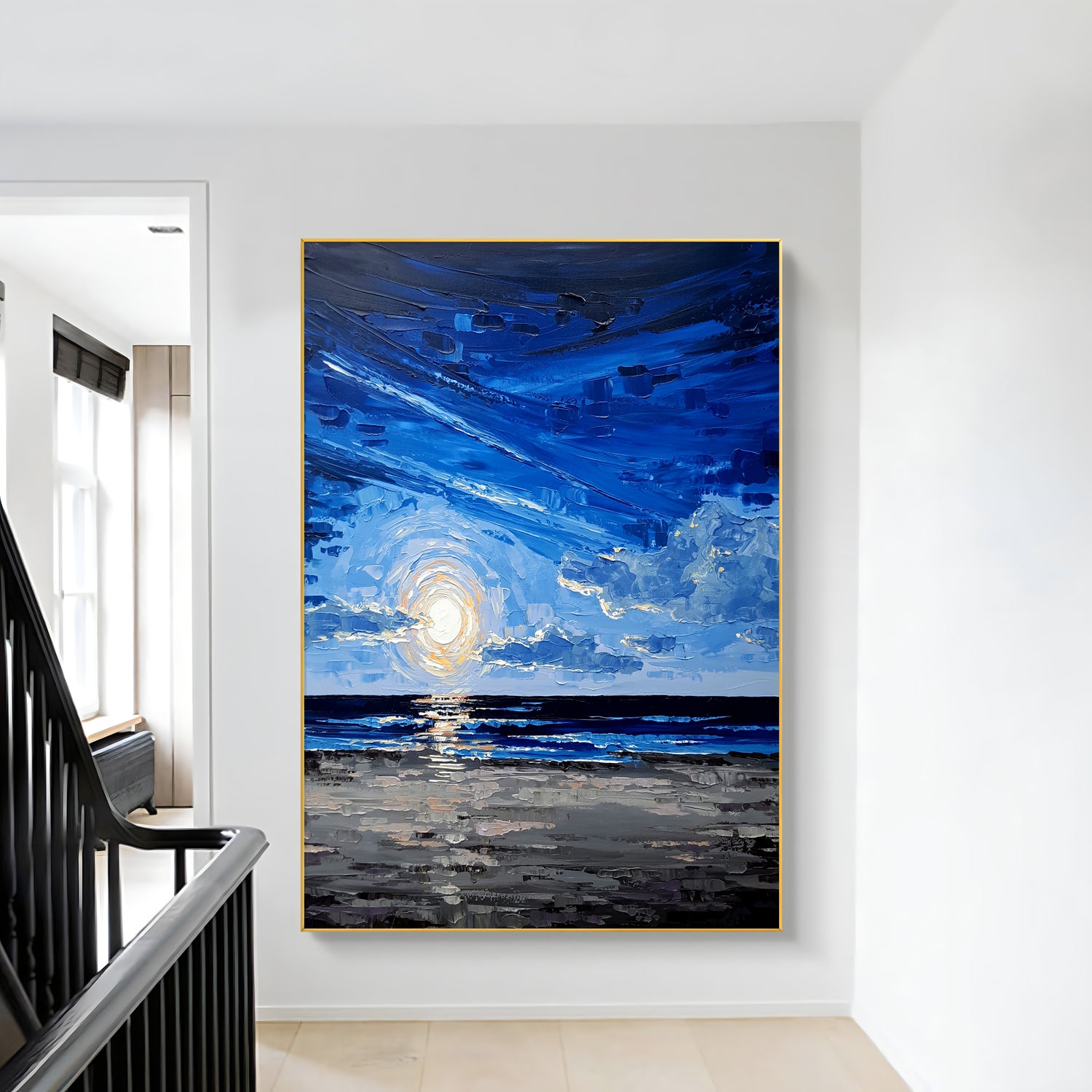 a painting hanging on a wall next to a stair case