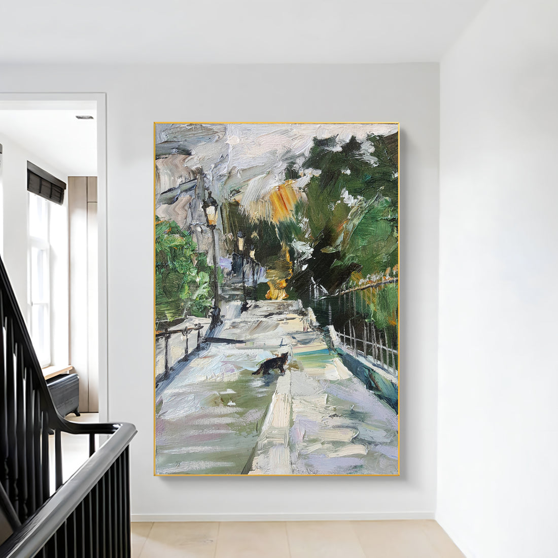 a painting hanging on a wall next to a banister