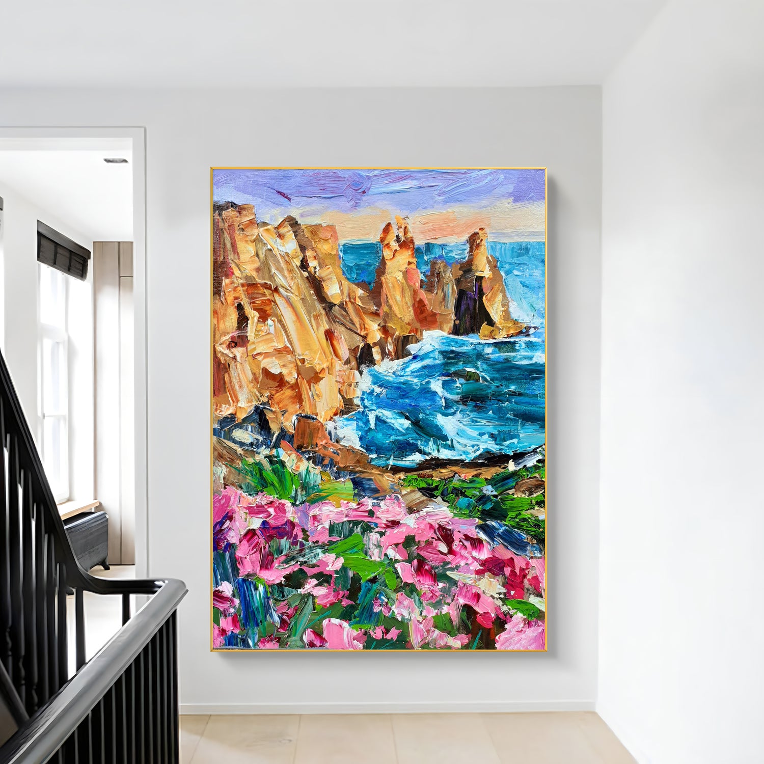 a painting hanging on a wall next to a stair case