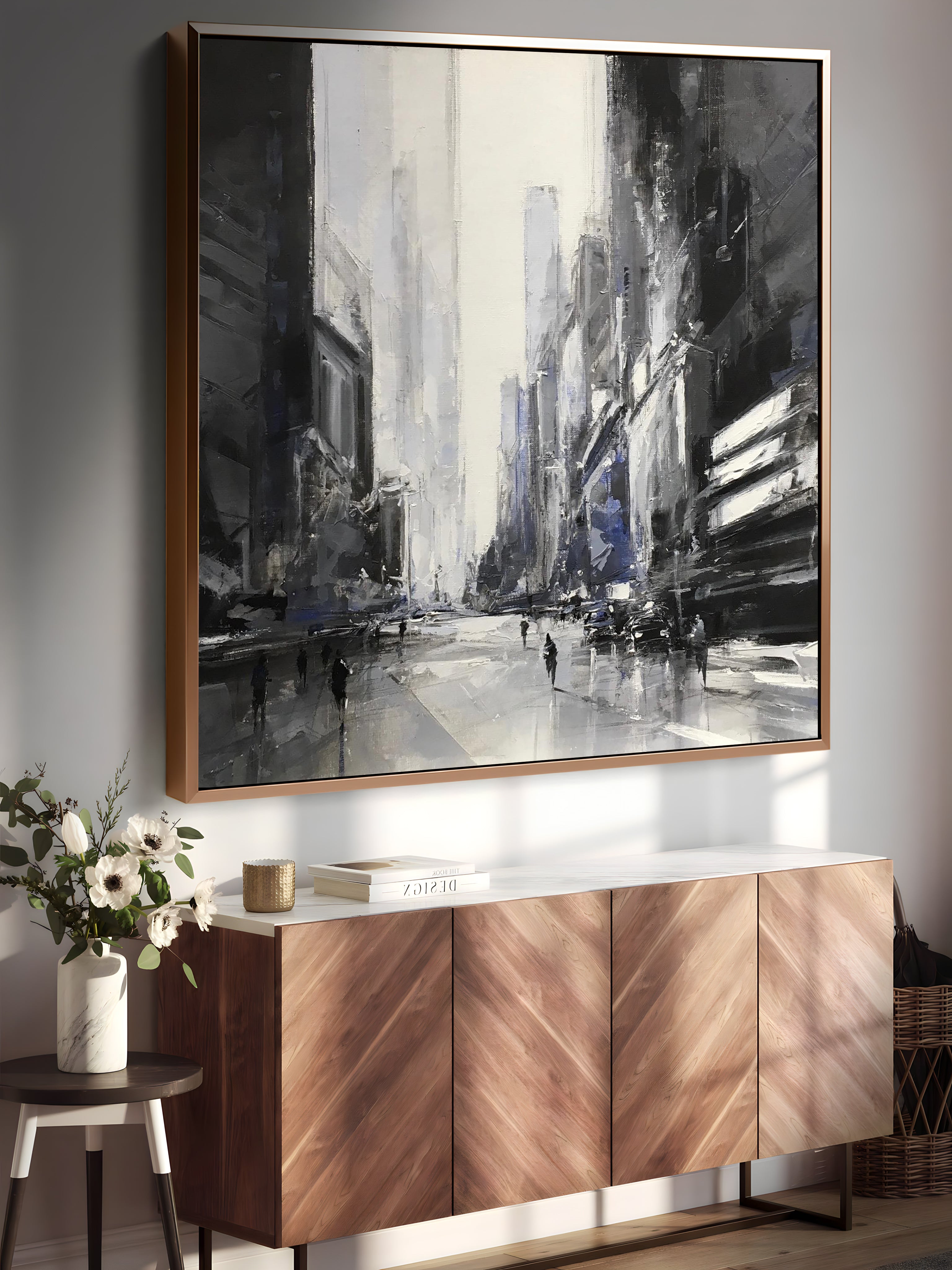 a painting hanging on a wall above a sideboard