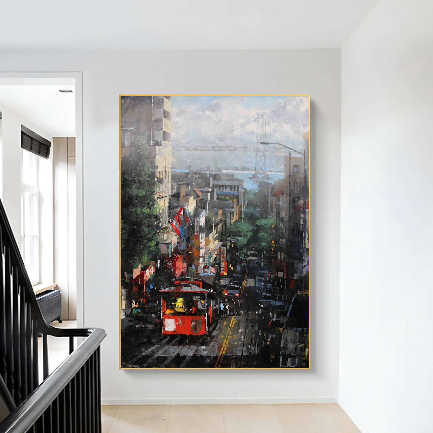 a painting hanging on a wall next to a stair case