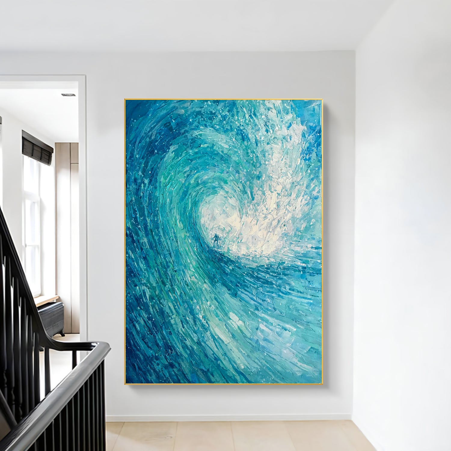 a painting hanging on a wall next to a stair case