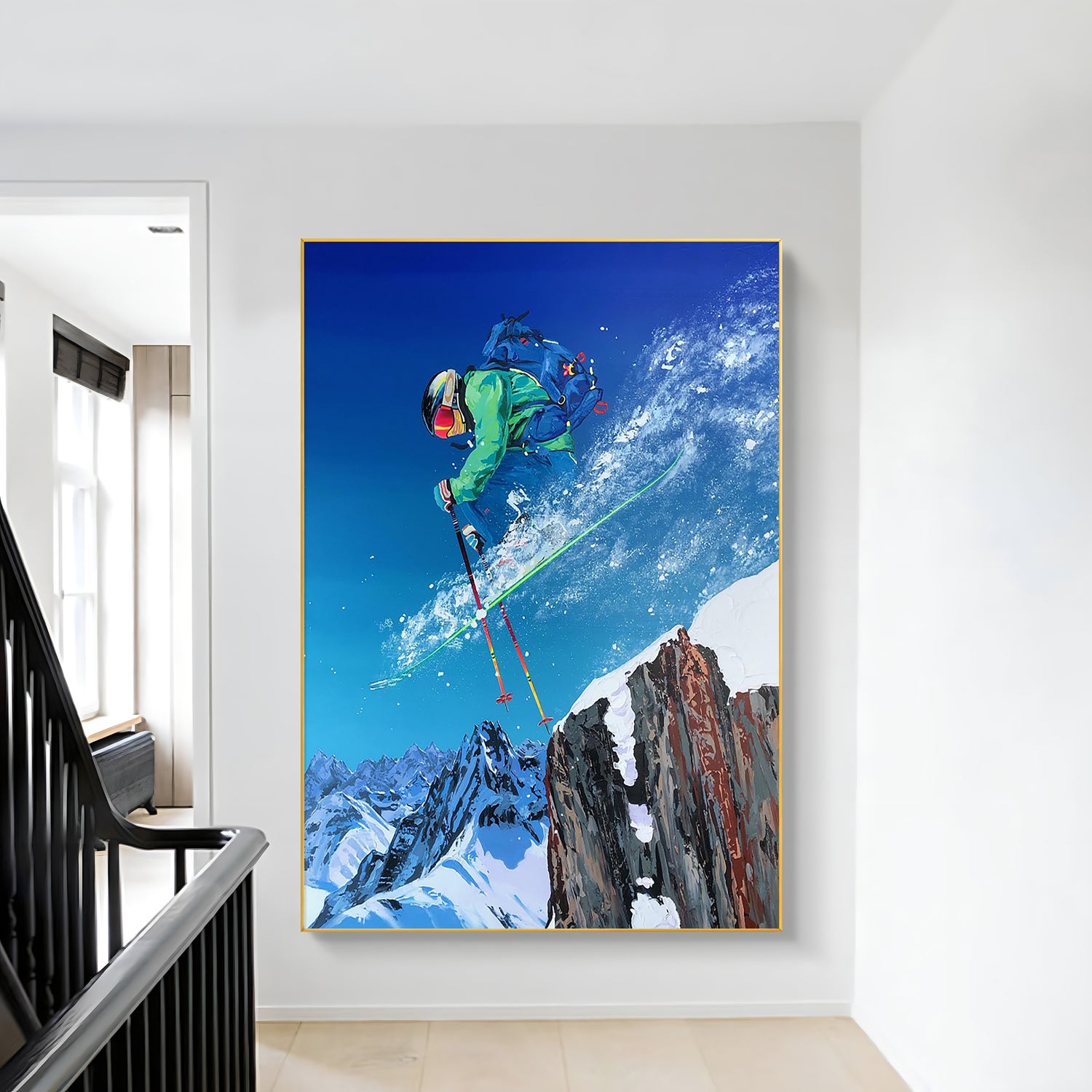 a man riding skis down the side of a snow covered slope