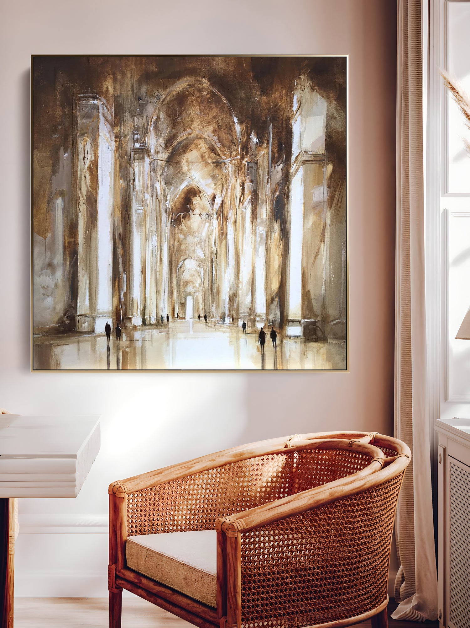 a painting hanging on a wall above a chair